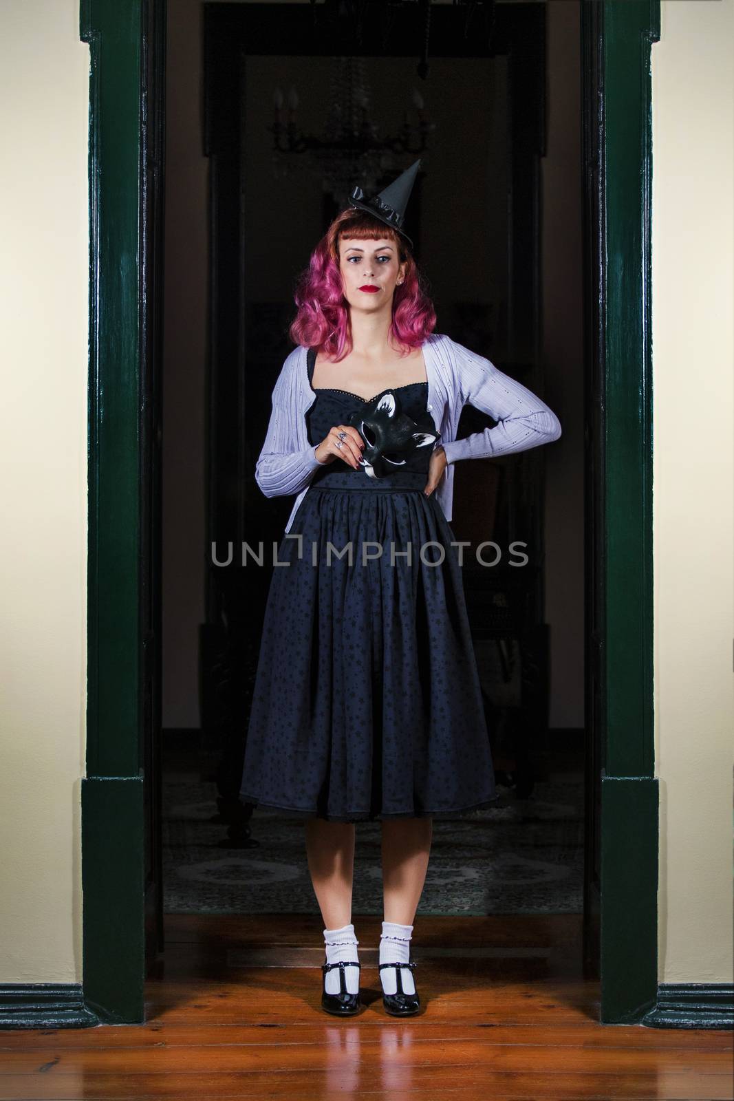 Halloween theme vintage girl on a old retro house.