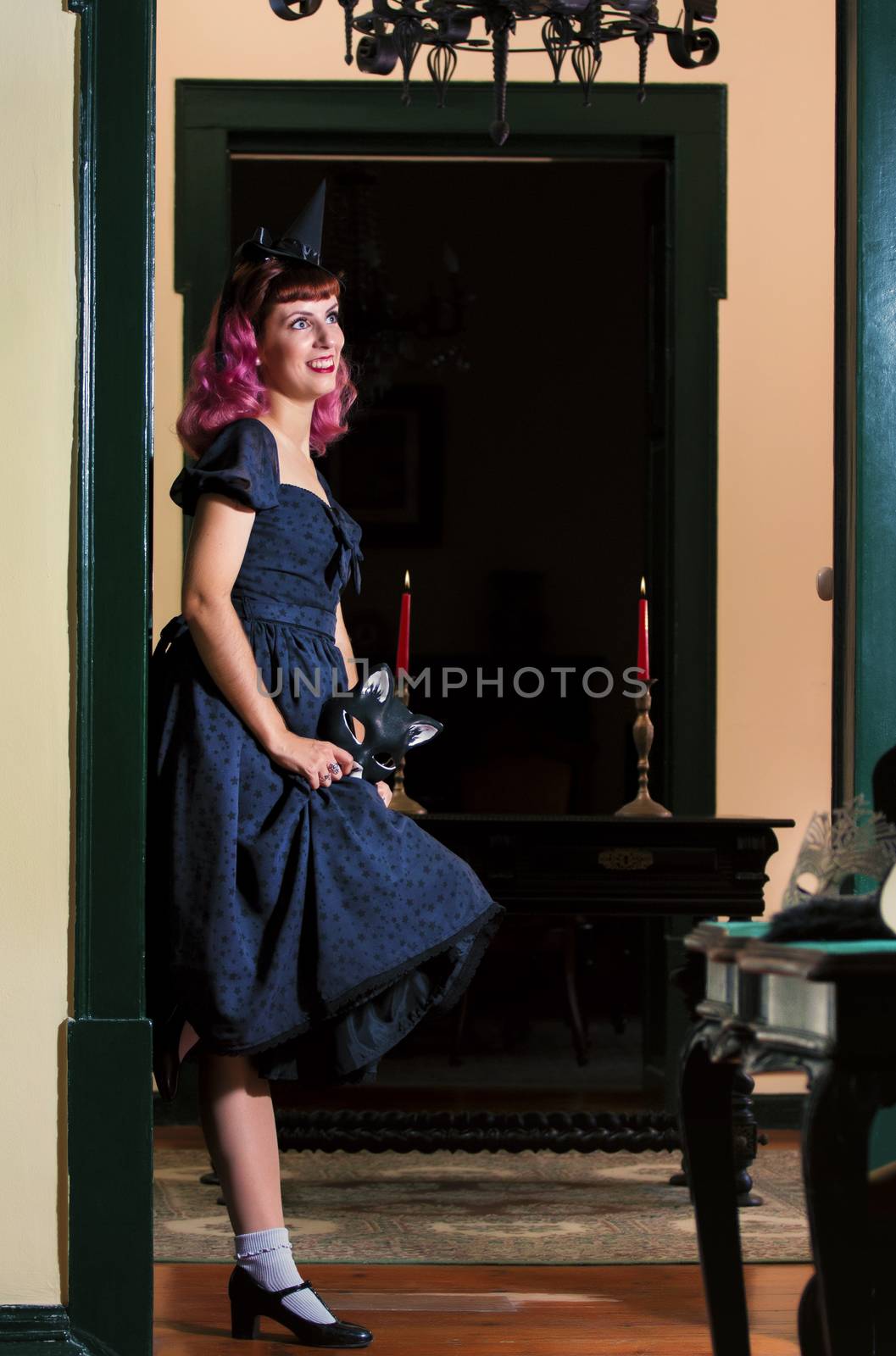 Halloween theme vintage girl on a old retro house.