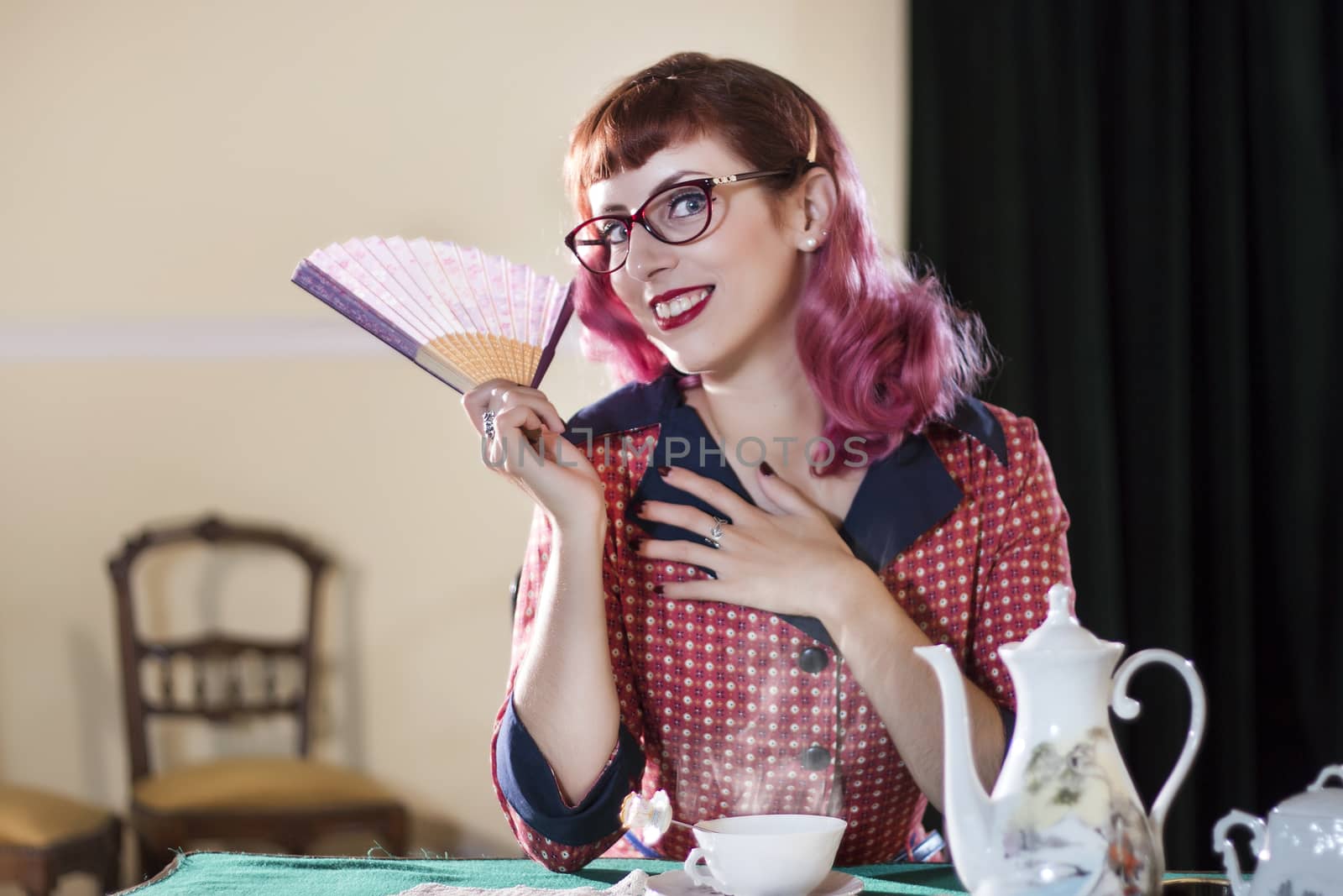 Vintage themed tea girl on a old retro house.