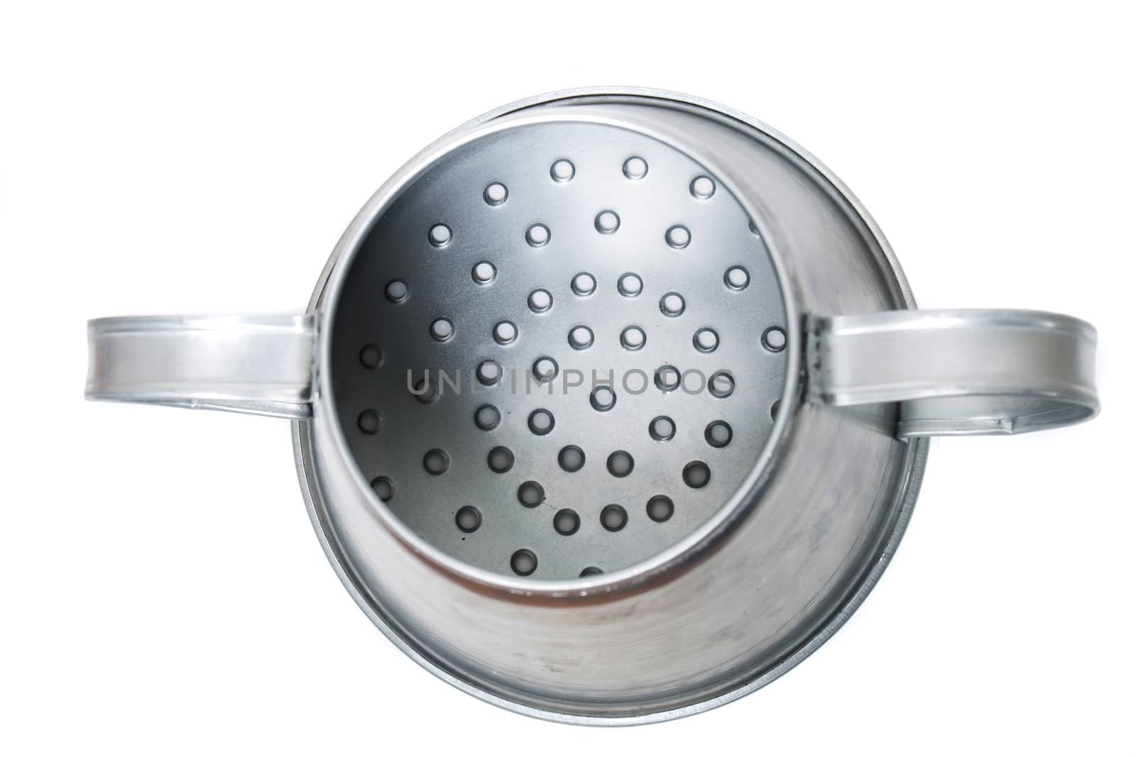 Close view of a metal rustic chestnut roaster isolated on a white background.