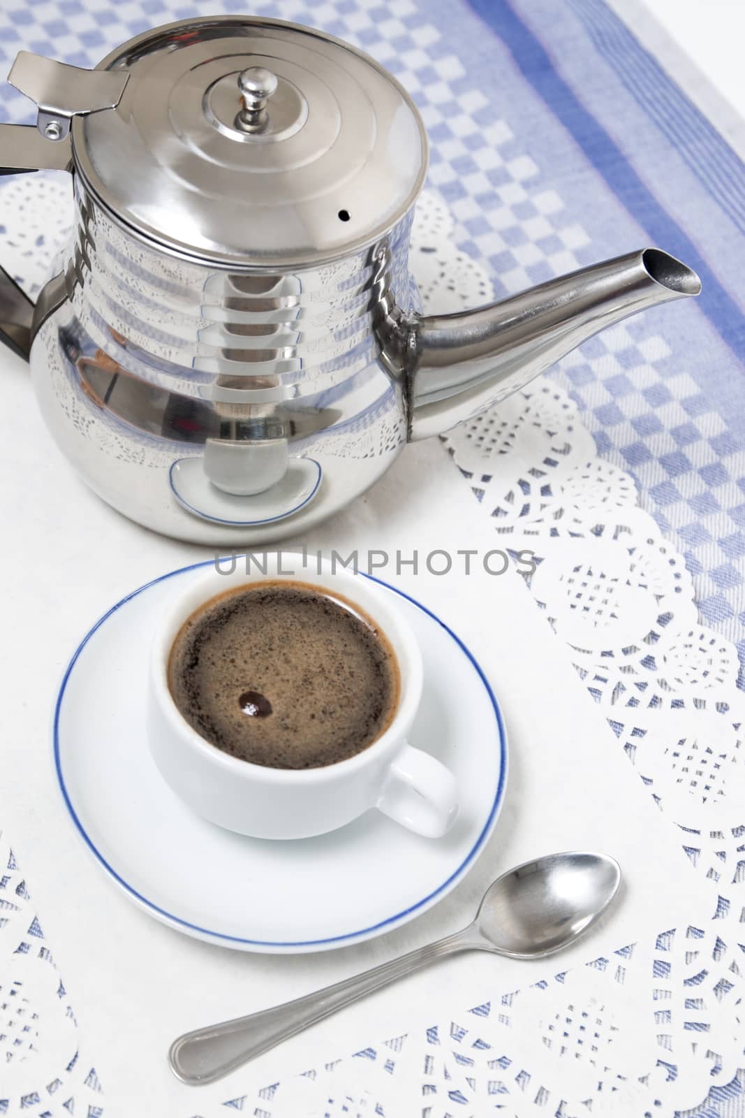 Composition of the classic coffee cup espresso on a table.