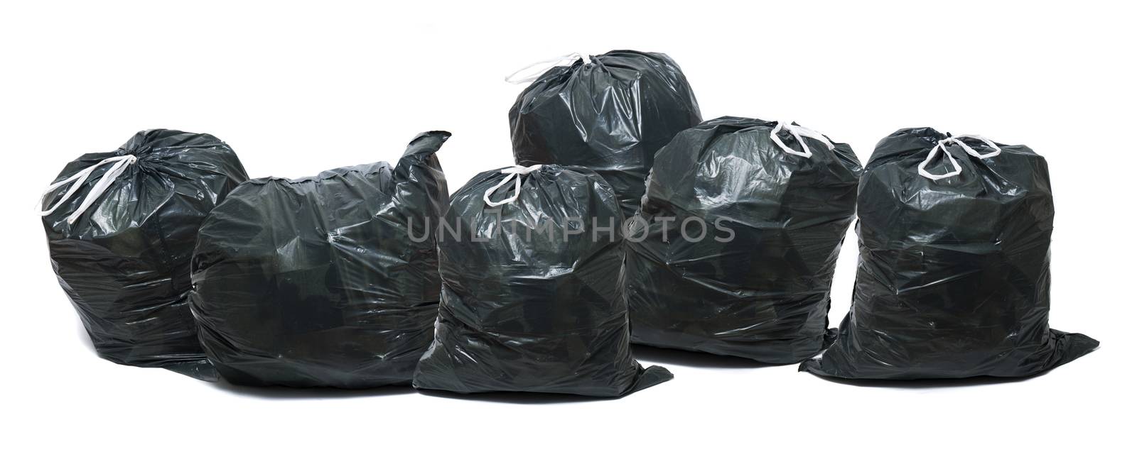 Group of green trash bags by membio