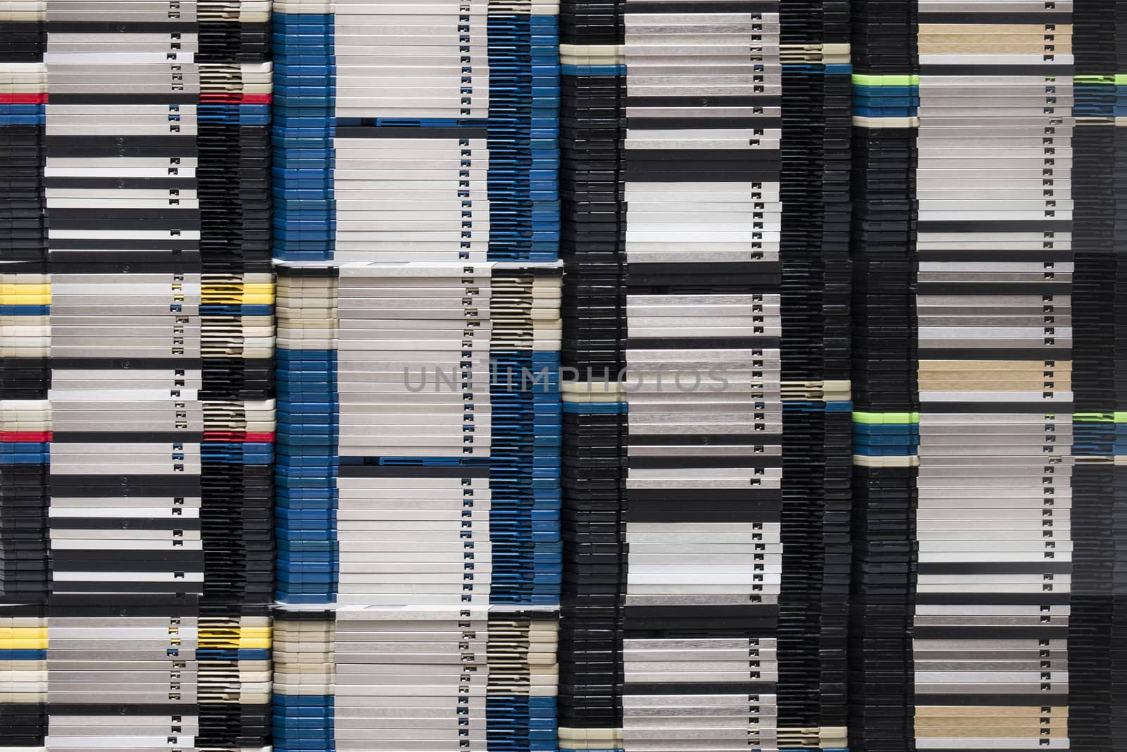 Vertical pile of computer floppy disks.