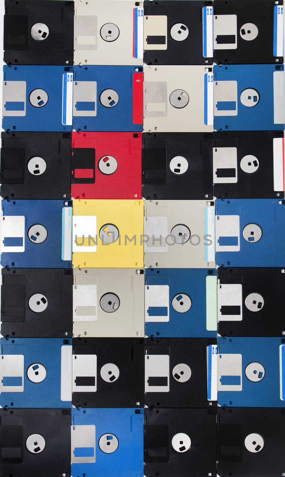 Full view of a background of many colorful floppy disks.