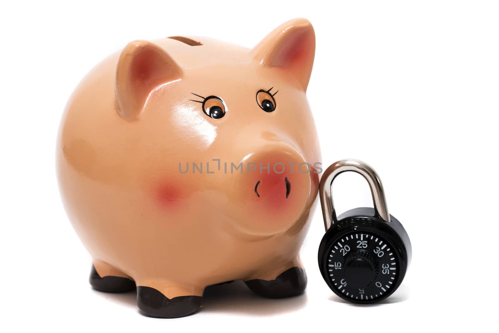 Close up view of a cute pink piggy bank with lock isolated on a white background.