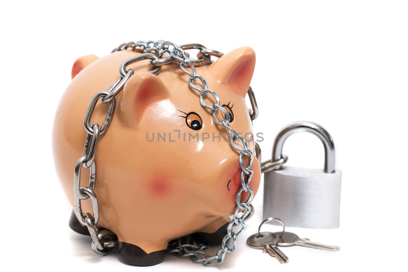 Close up view of a cute pink piggy bank with lock isolated on a white background.