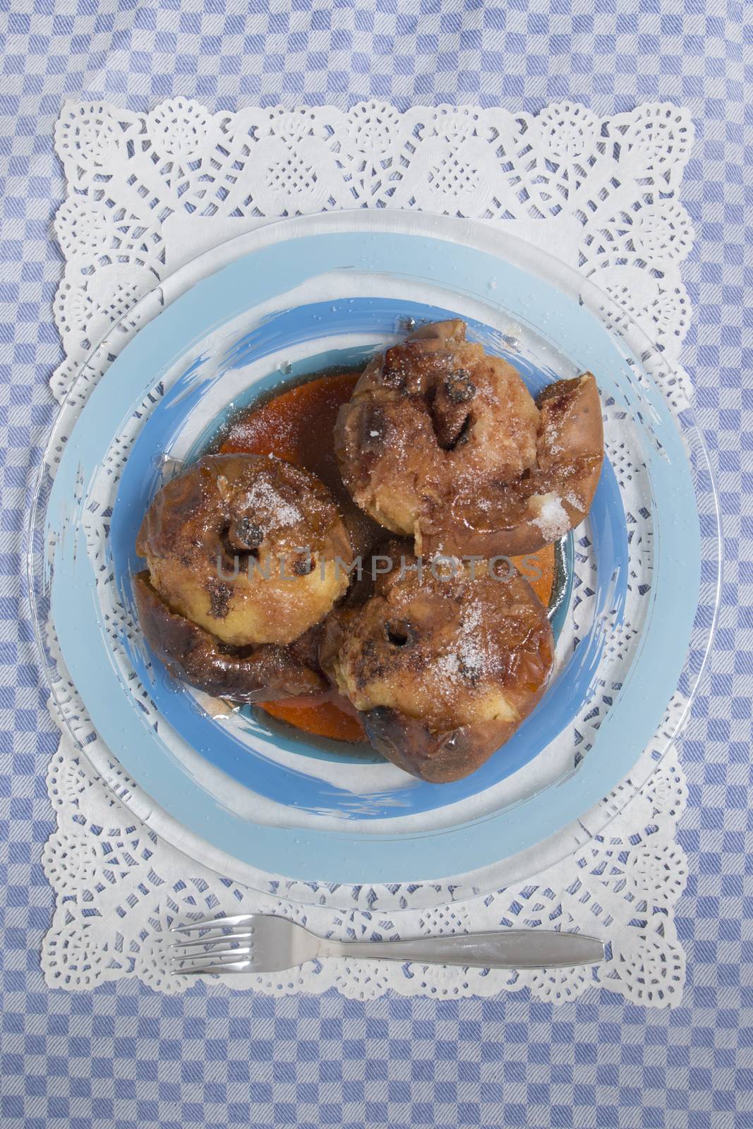 Oven baked apples with cinnamon, sugar honey and red wine.