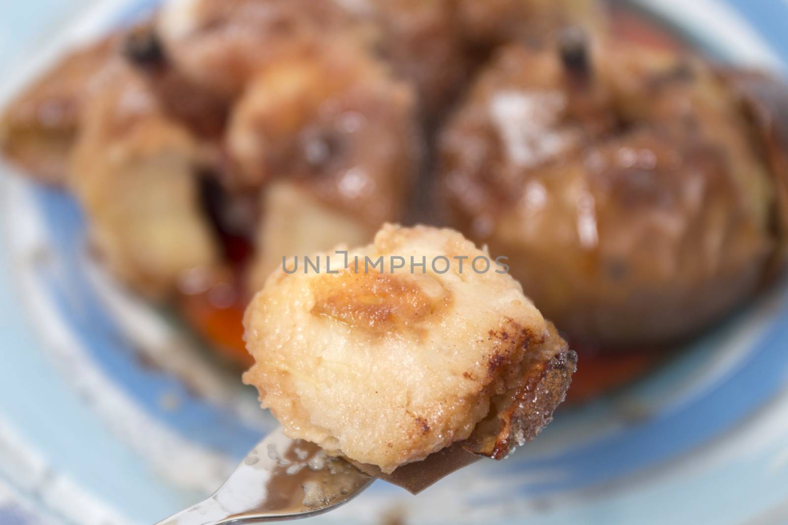 Oven baked apples with cinnamon, sugar honey and red wine.