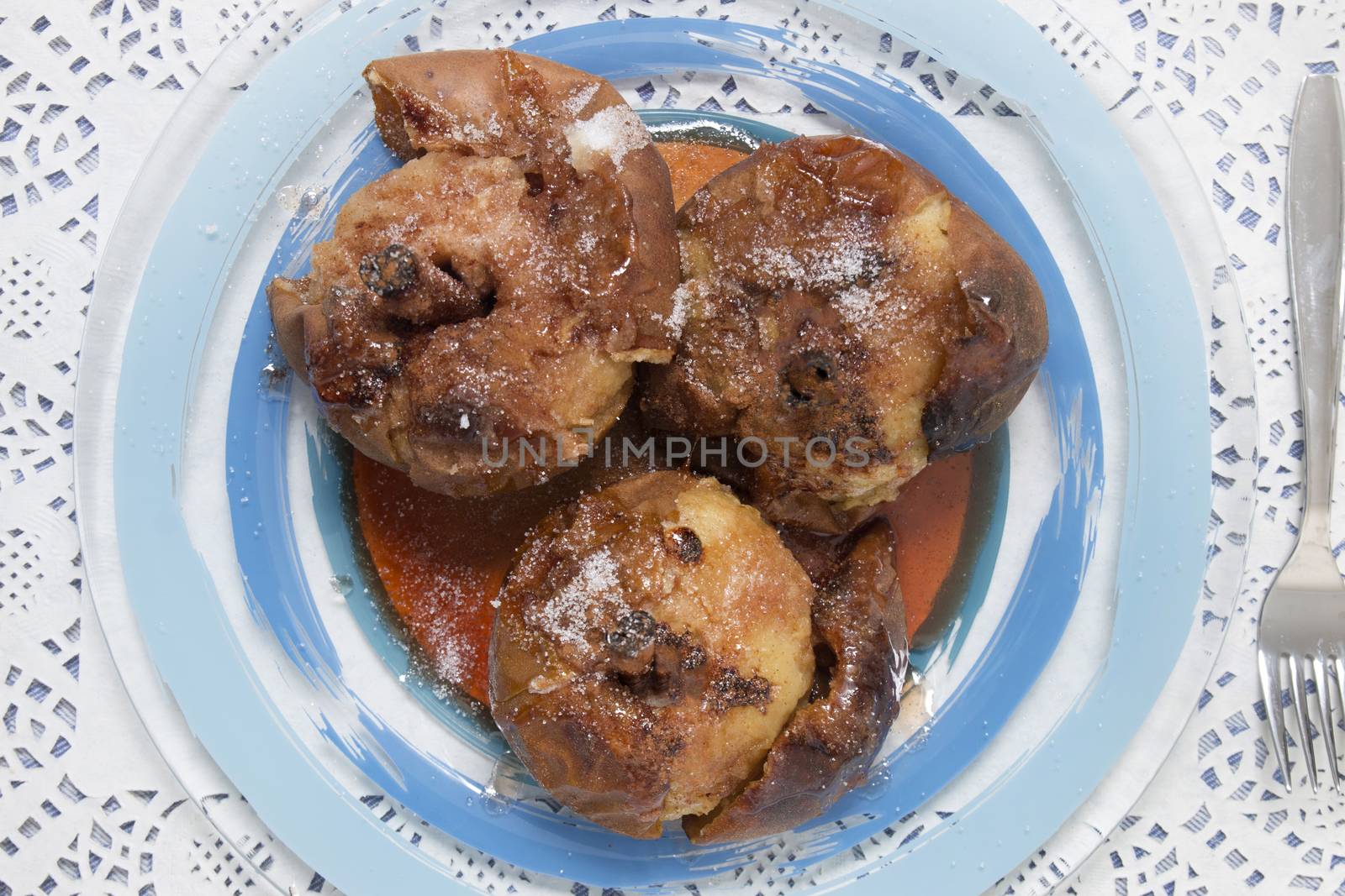 Oven baked apples with cinnamon, sugar honey and red wine.