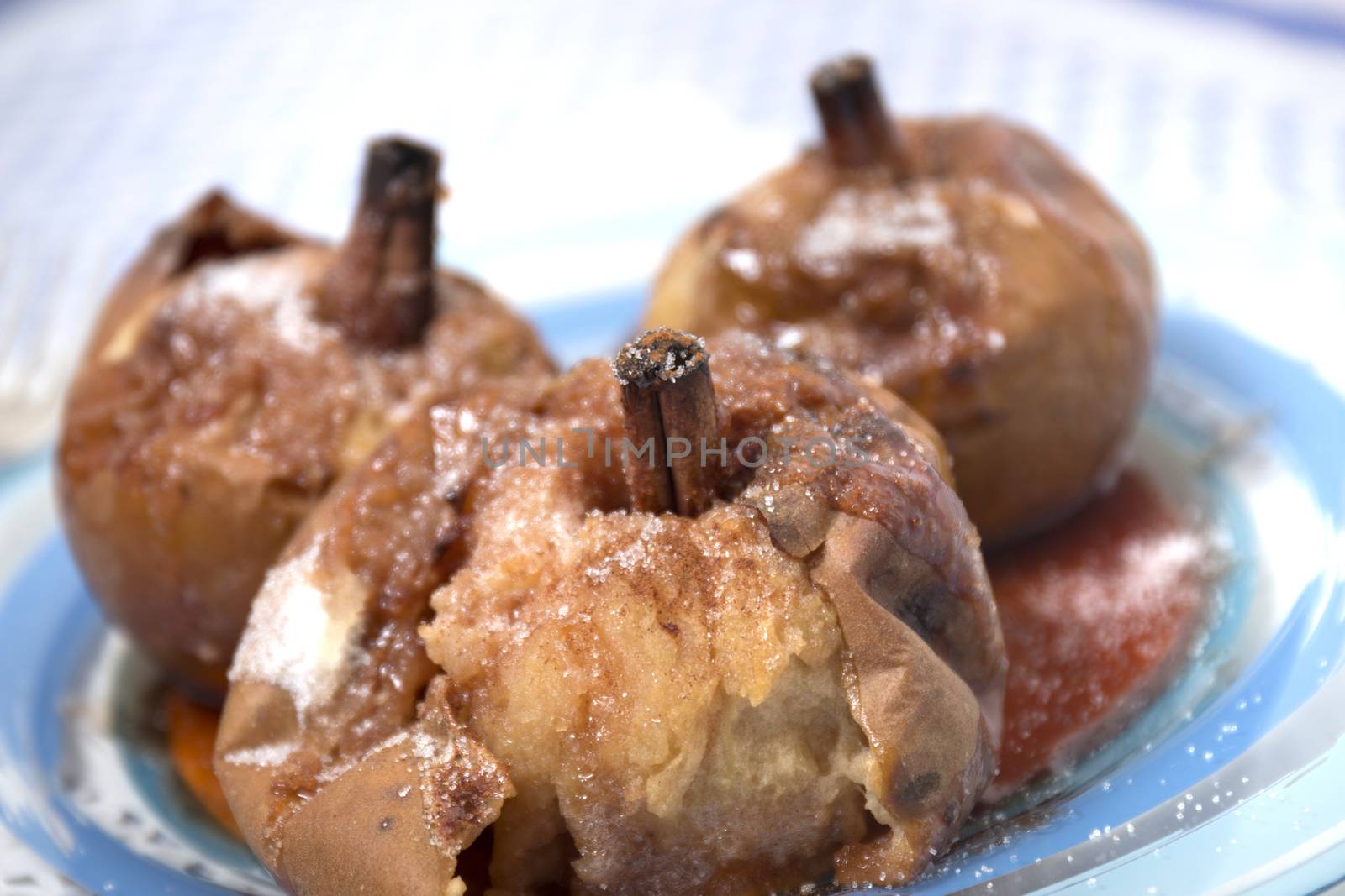 Oven baked apples with cinnamon, sugar honey and red wine.