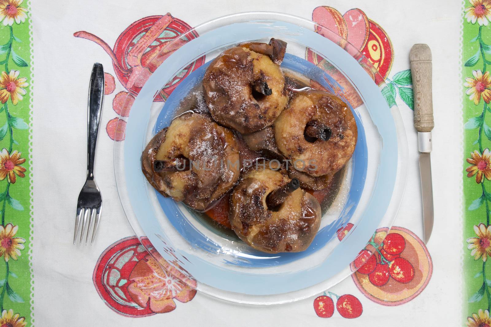 Oven baked apples with cinnamon, sugar honey and red wine.