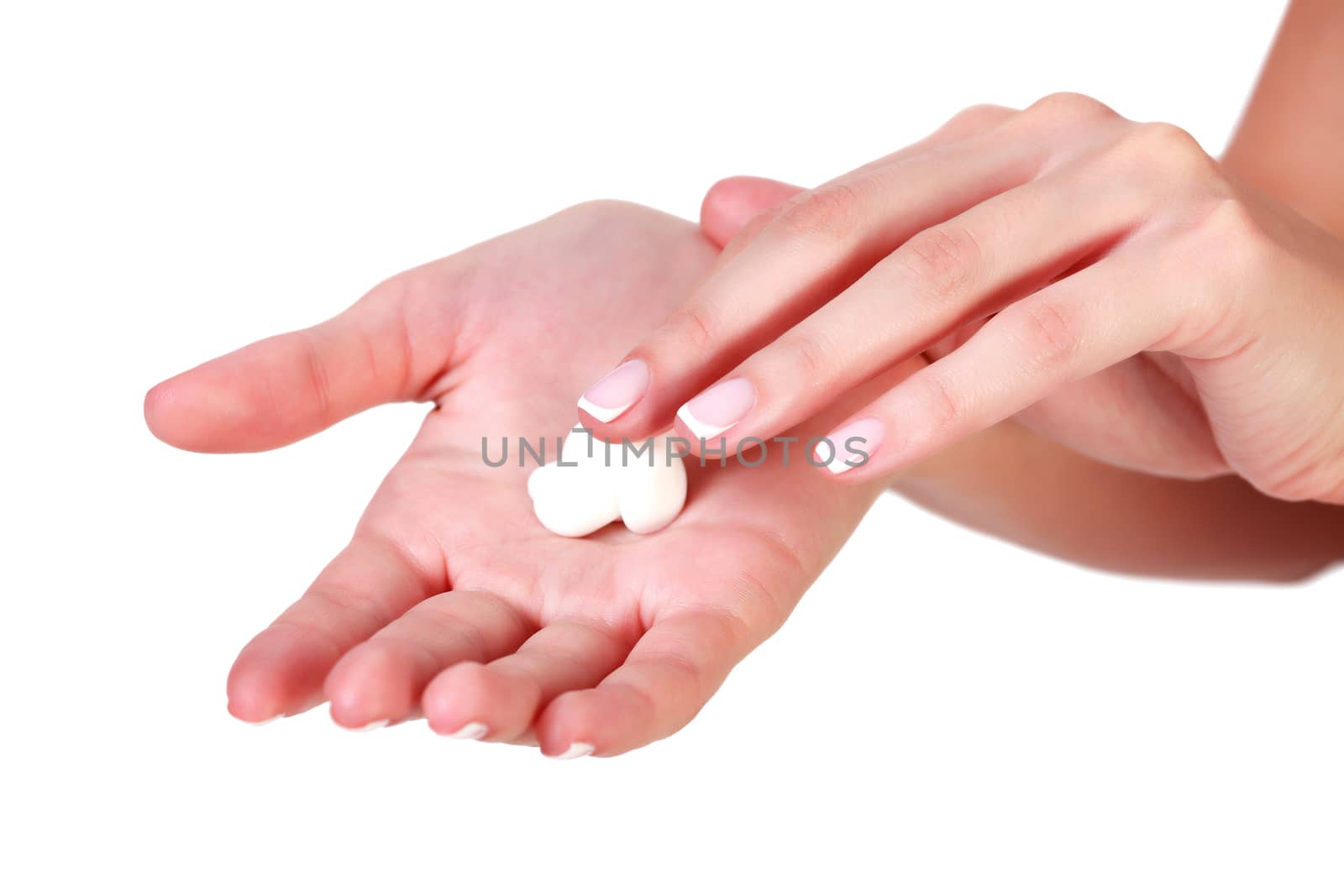 Closeup shot of beautiful woman's hands with cream, isolated on white background