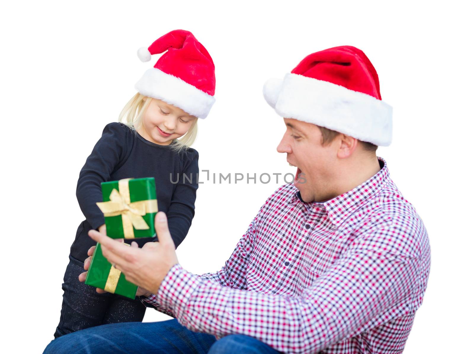 Happy Young Girl and Father Wearing Santa Hats Opening Gift Box Isolated on White.