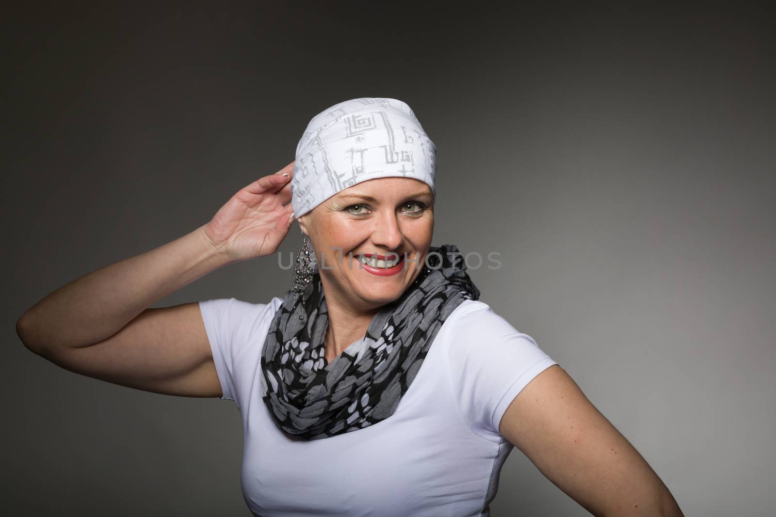 beautiful woman cancer patient wearing headscarf by artush