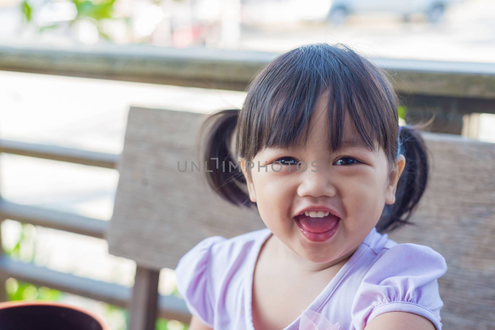 Portrait of cute children smiling girl is happy.