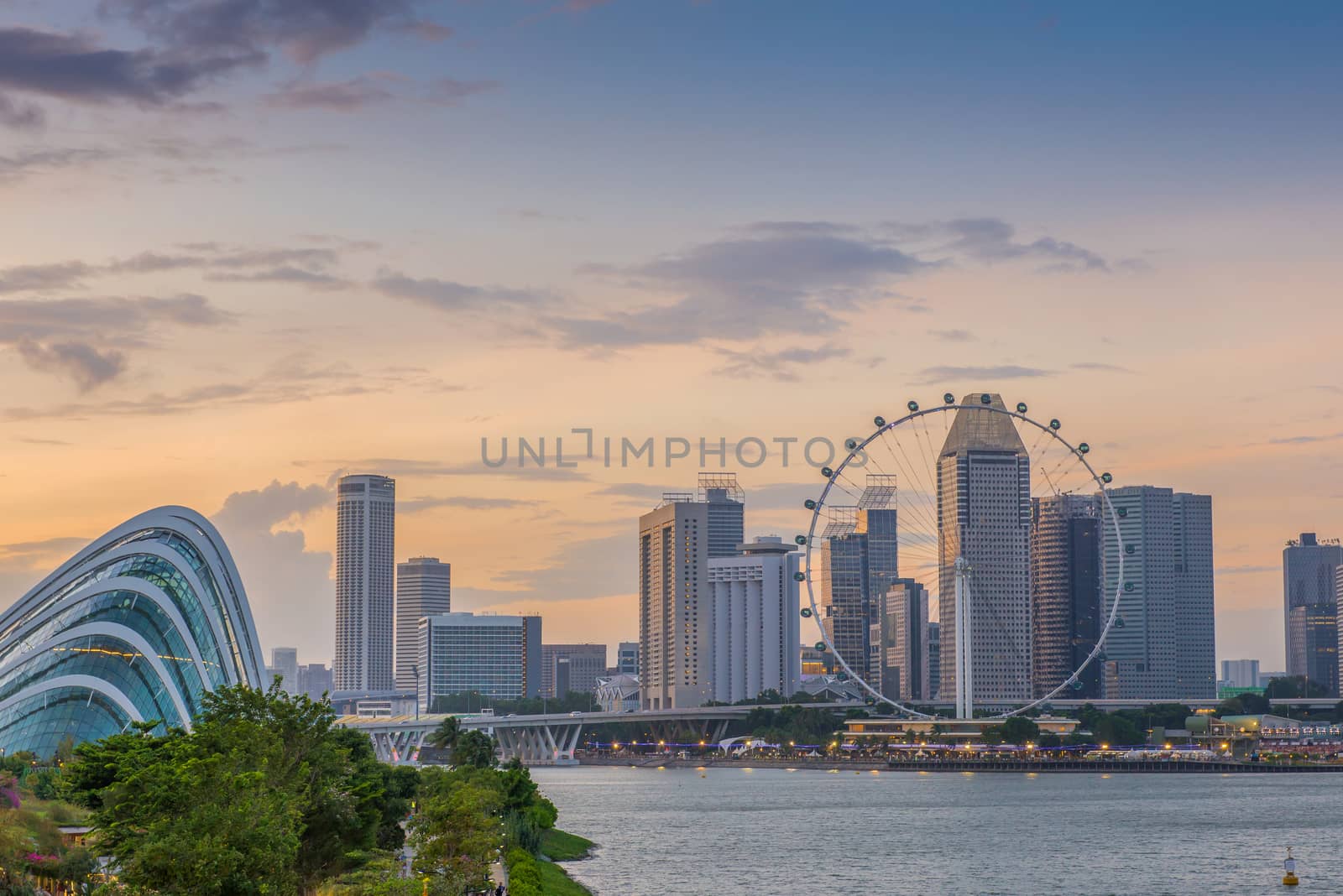 Singapore landmark city skyline at the Marina bay during twilight.