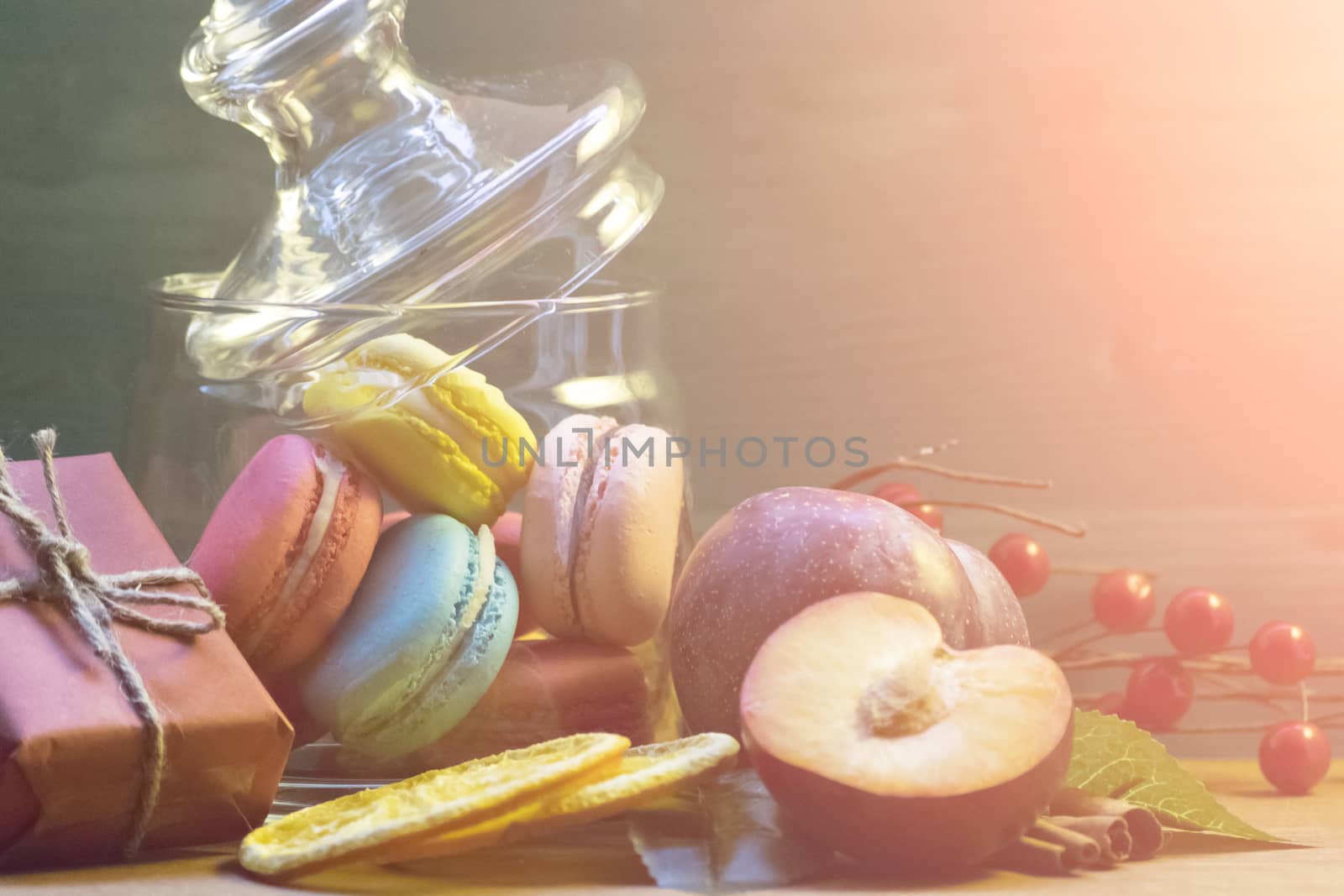 Fruits, sweets, gift. Festive cozy mood. Soft focus. Background.