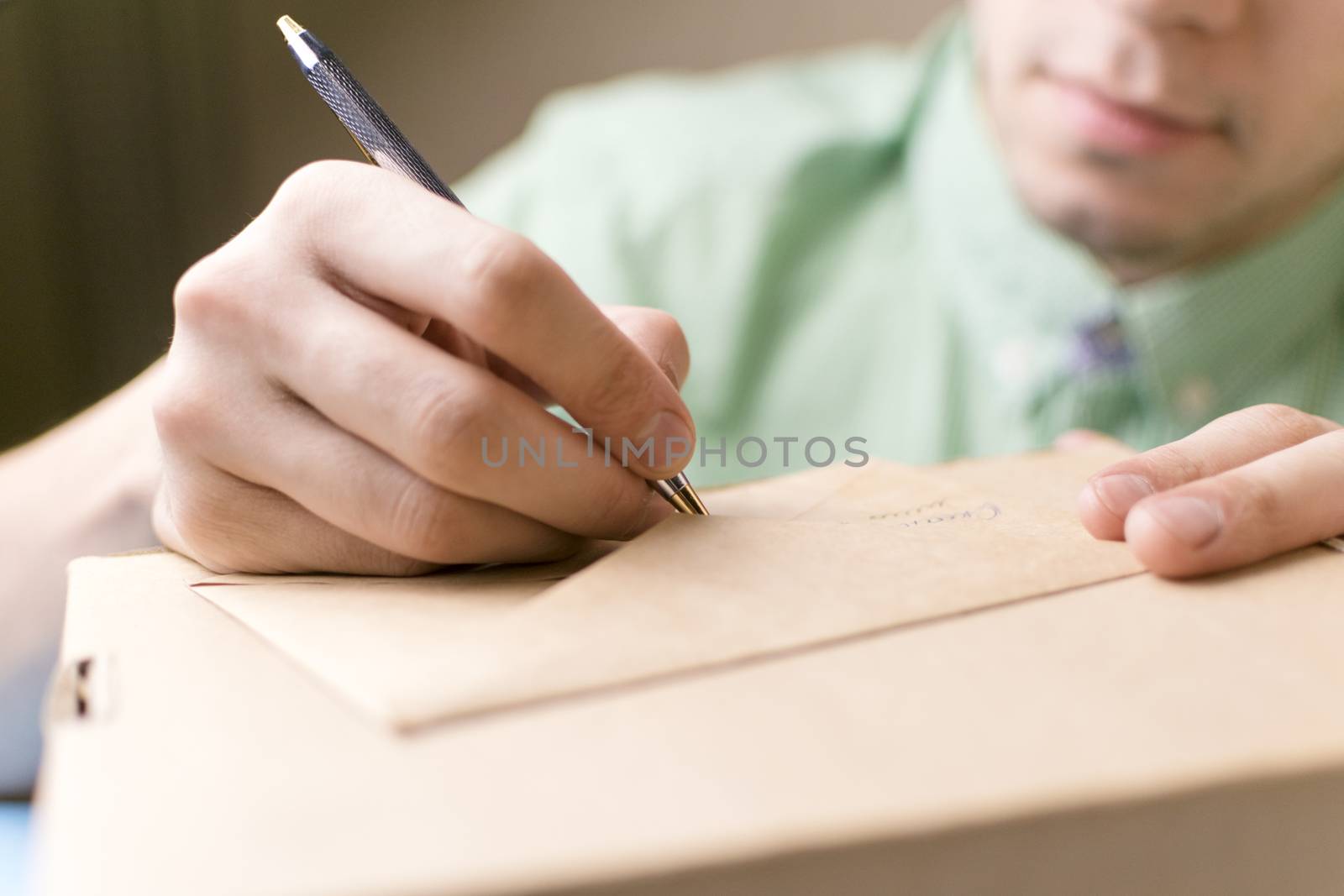 Male signs for receiving mail, parcel.