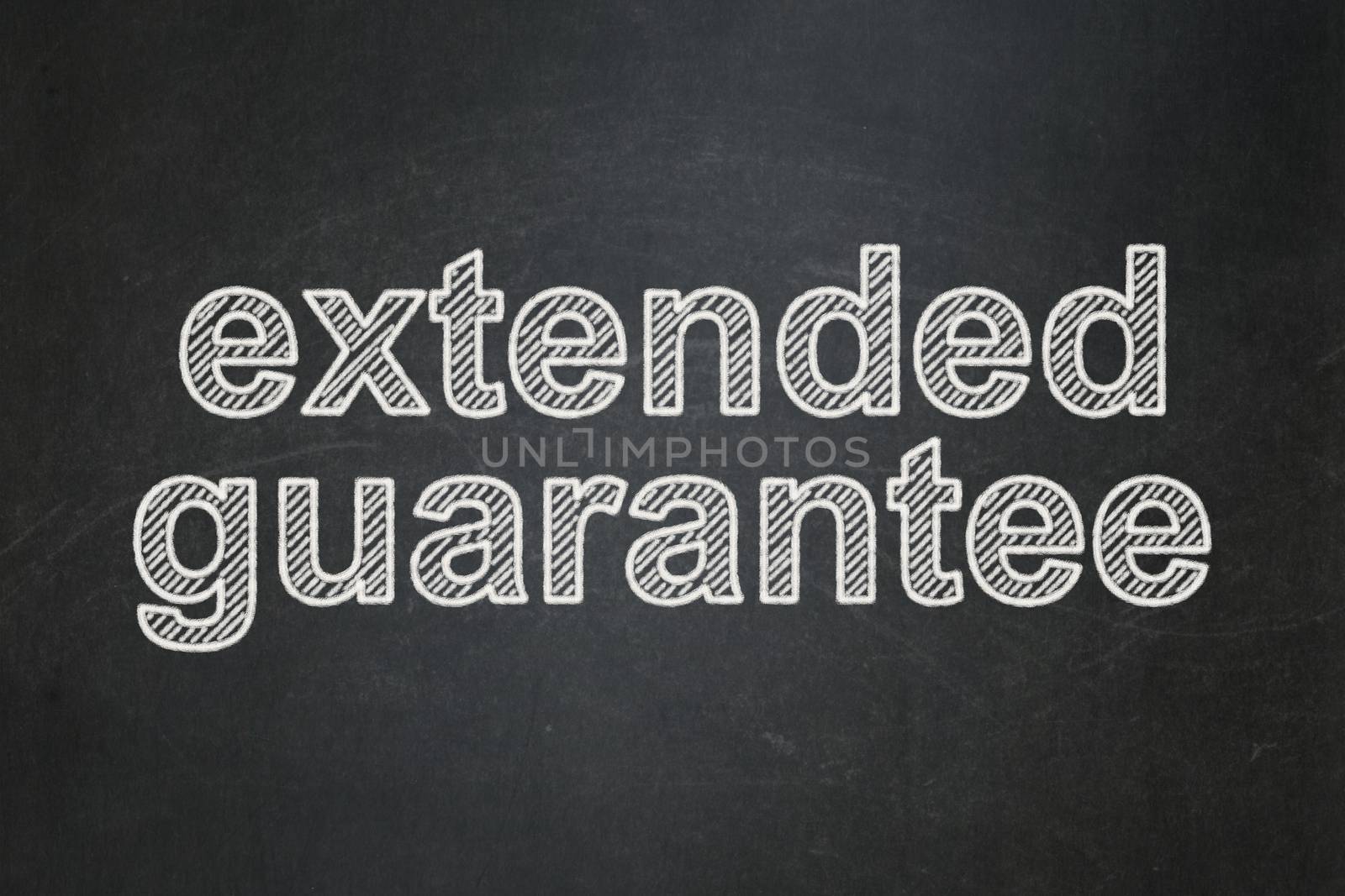 Insurance concept: text Extended Guarantee on Black chalkboard background