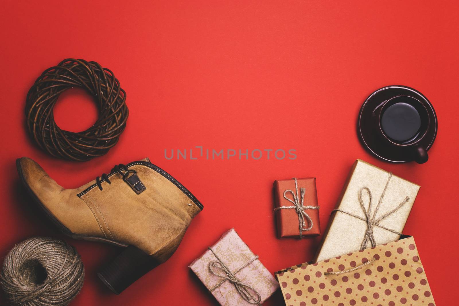 The holiday gifts on a red background, the concept of black Friday, sales.