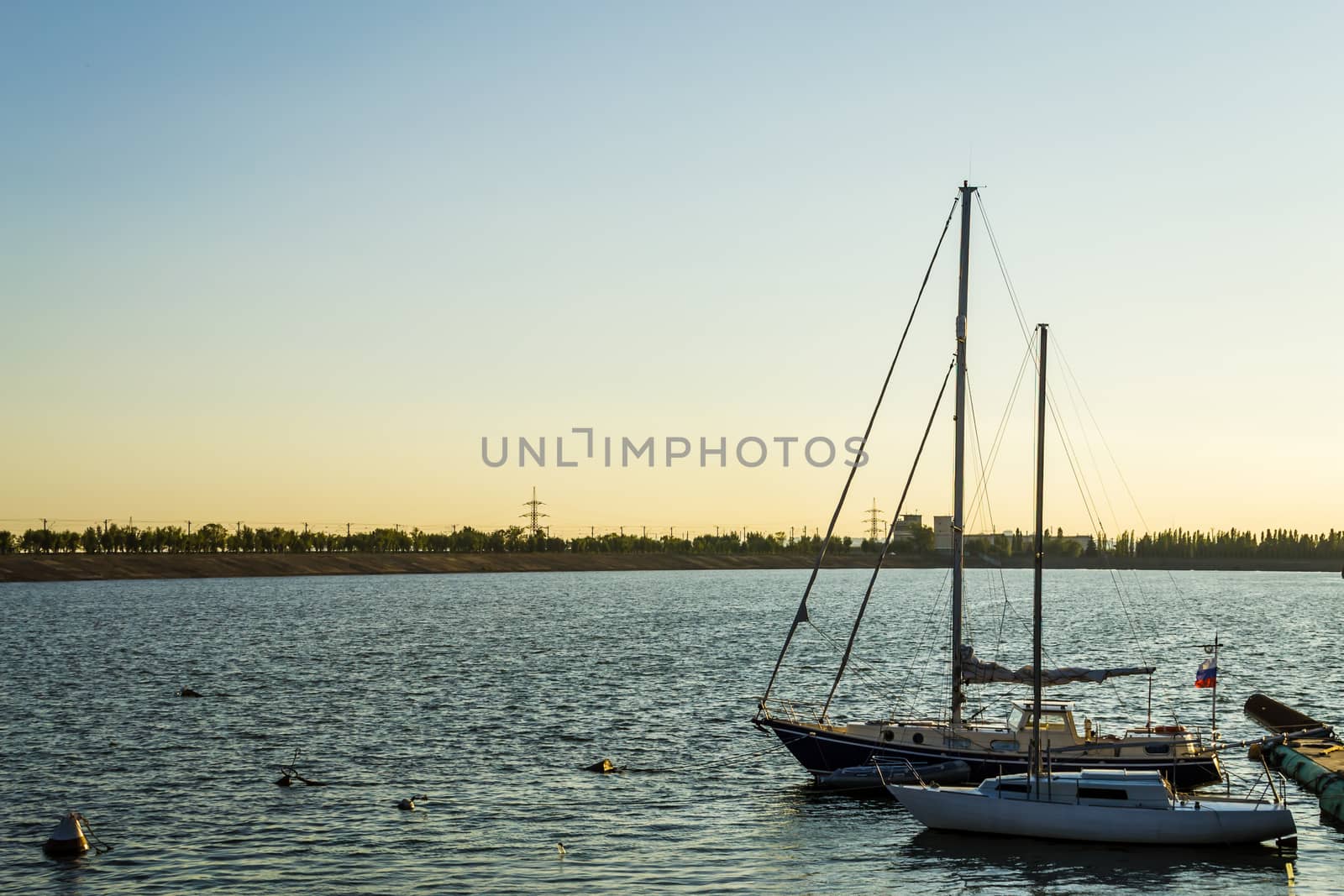 boats on the river sunset river Volga port of ships