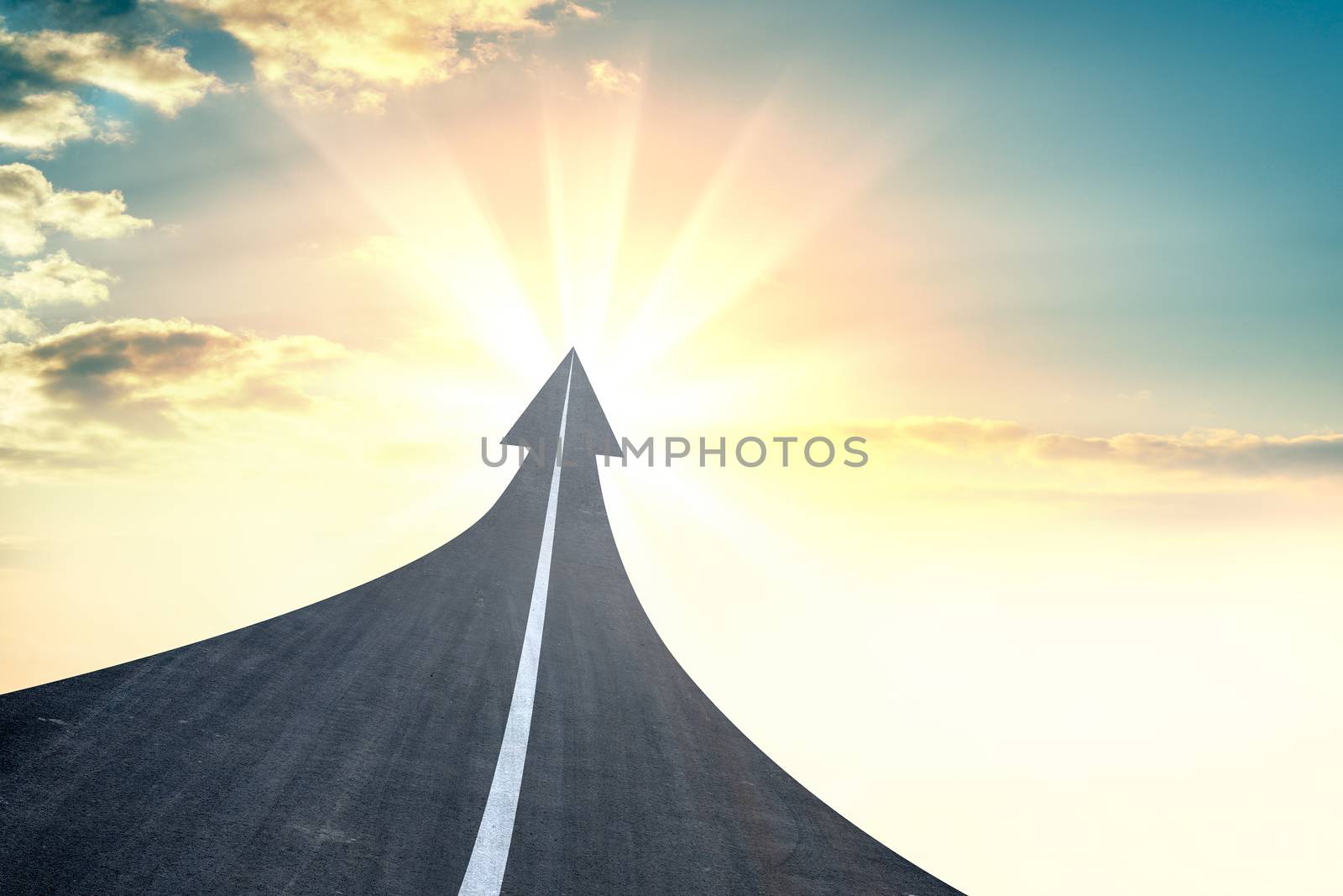 Highway road going up as an arrow. Sunset or sunrise in the background