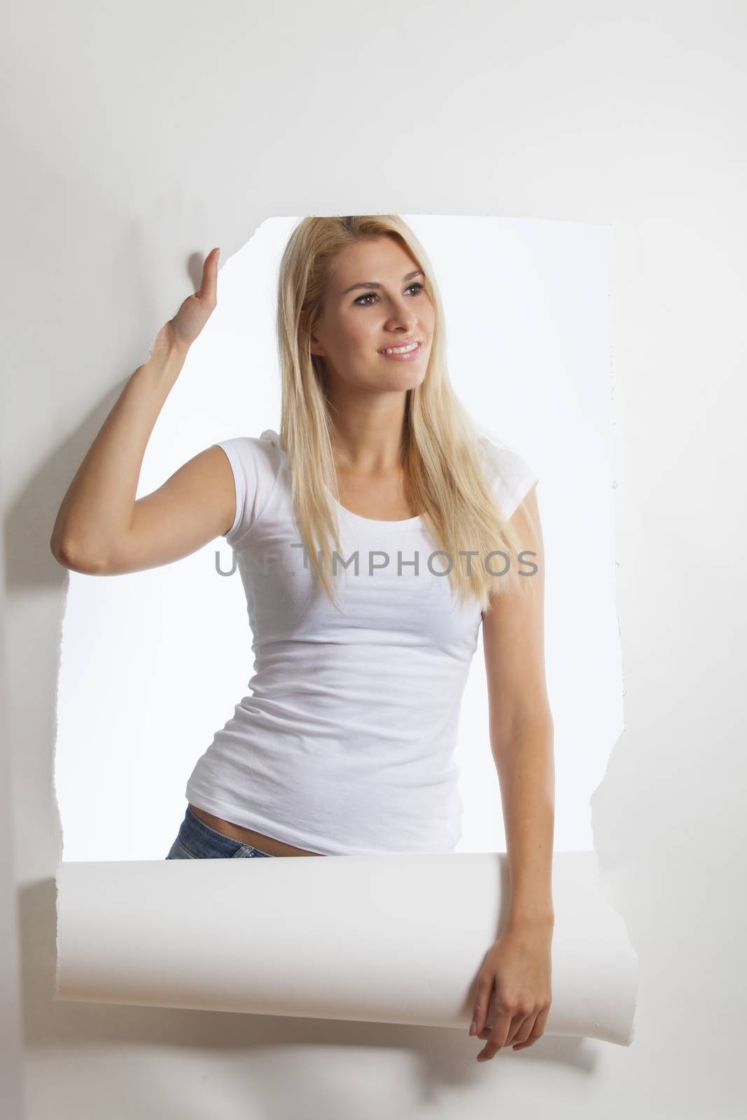attractive young blonde woman on white background