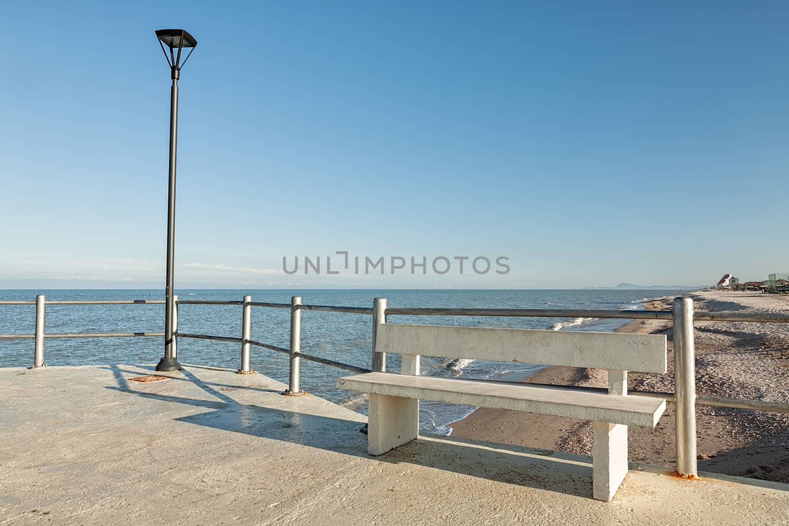 The viewpoint on the beach with bench and street light of Marotta, Italy