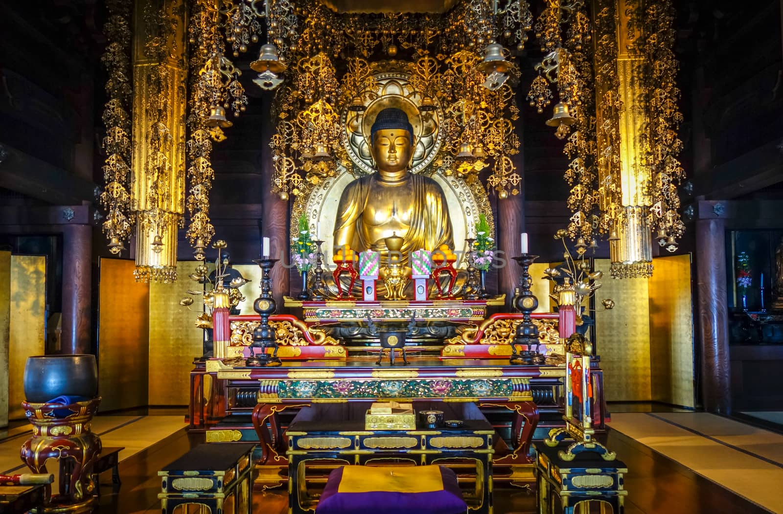 Golden Buddha in Chion-In Temple, Kyoto, Japan by daboost