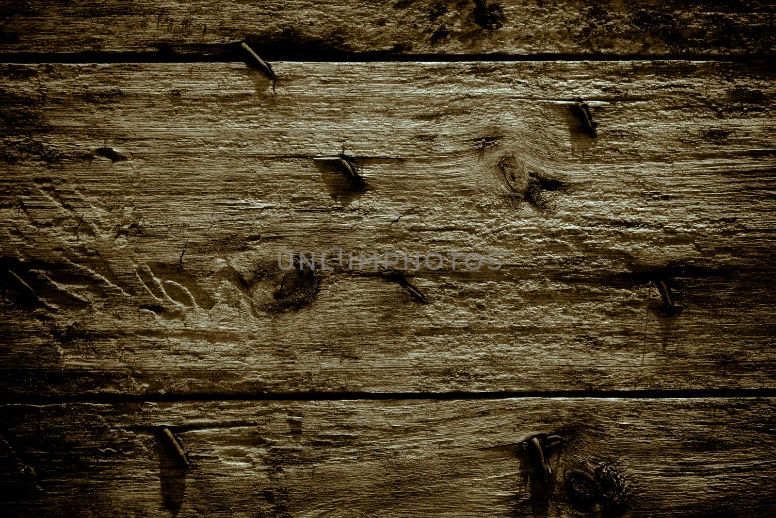 Old wooden floor with rusted nail attached to the wood surface. by N_u_T