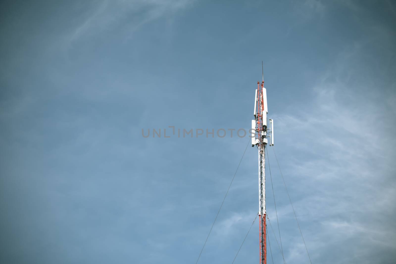 Telecom blue sky background,Phone antenna