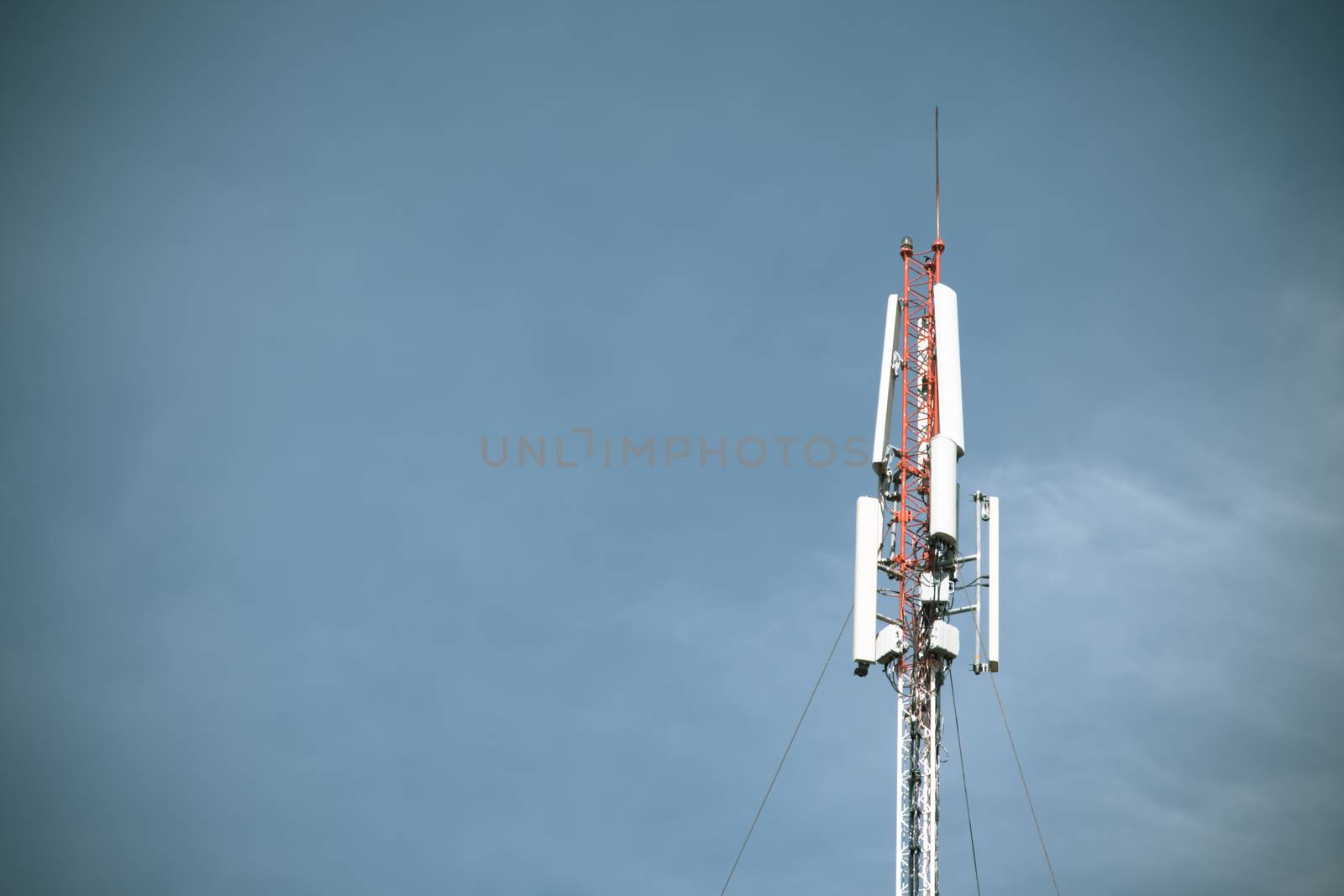 Telecom blue sky background,Phone antenna