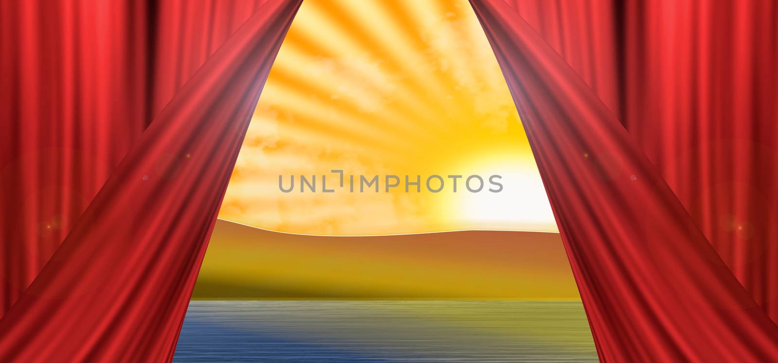 Skyline view of mountains and lake with a setting sun with open theater curtain