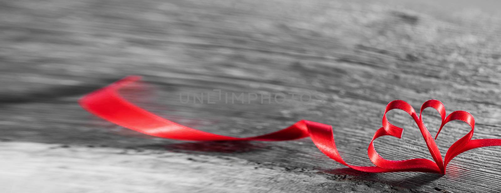 Two red ribbon hearts on wooden backround, Valentine day concept