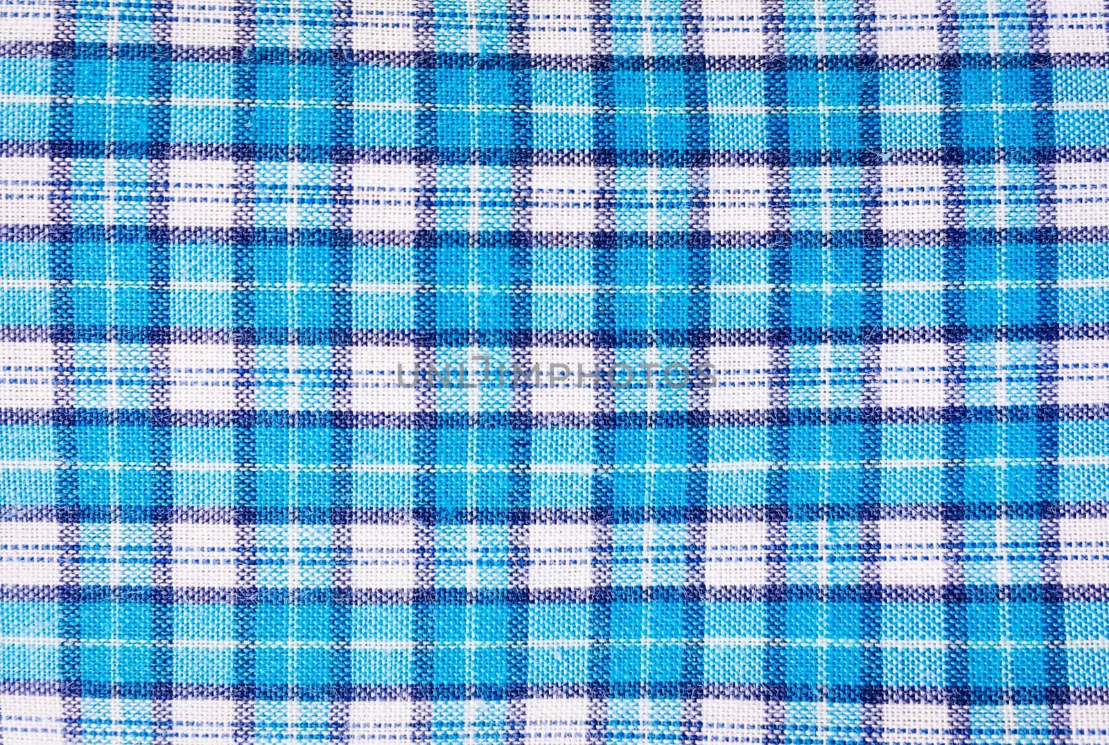 textile blue box, fabric blue plaid cover. Blue classic checkered pattern. blue checkered fabric closeup , tablecloth texture. by titco