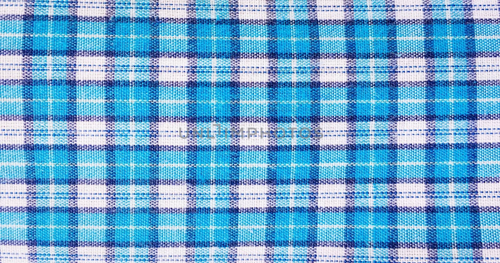 textile blue box, fabric blue plaid cover. Blue classic checkered pattern. blue checkered fabric closeup , tablecloth texture