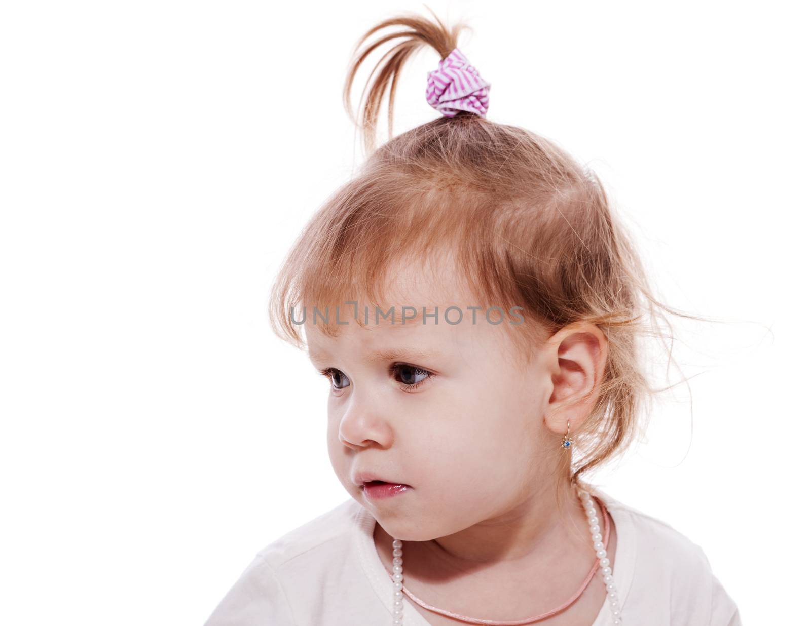 Little girl sad portrait looking away isolated