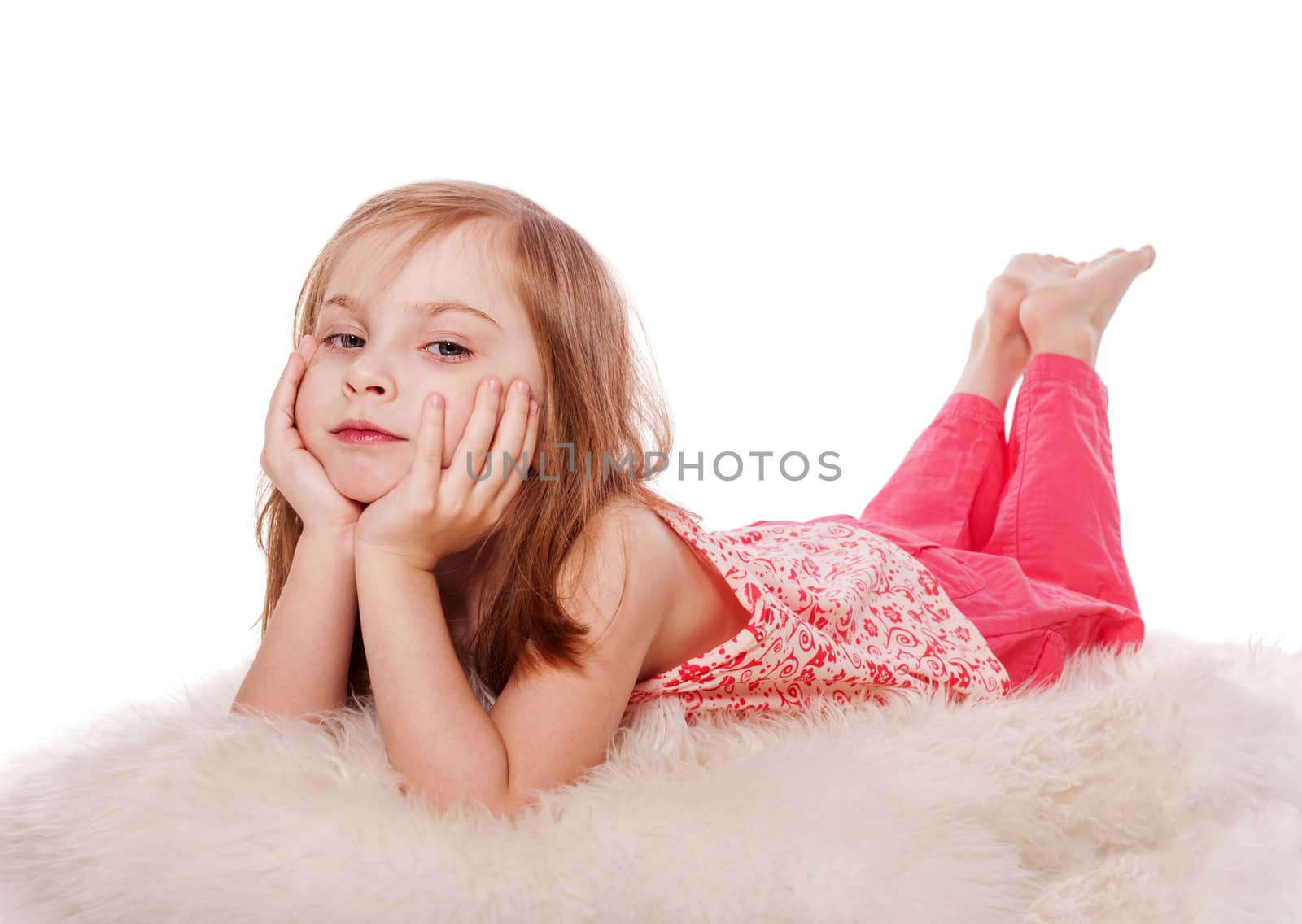 Lying little girl happy portrait isolated on white