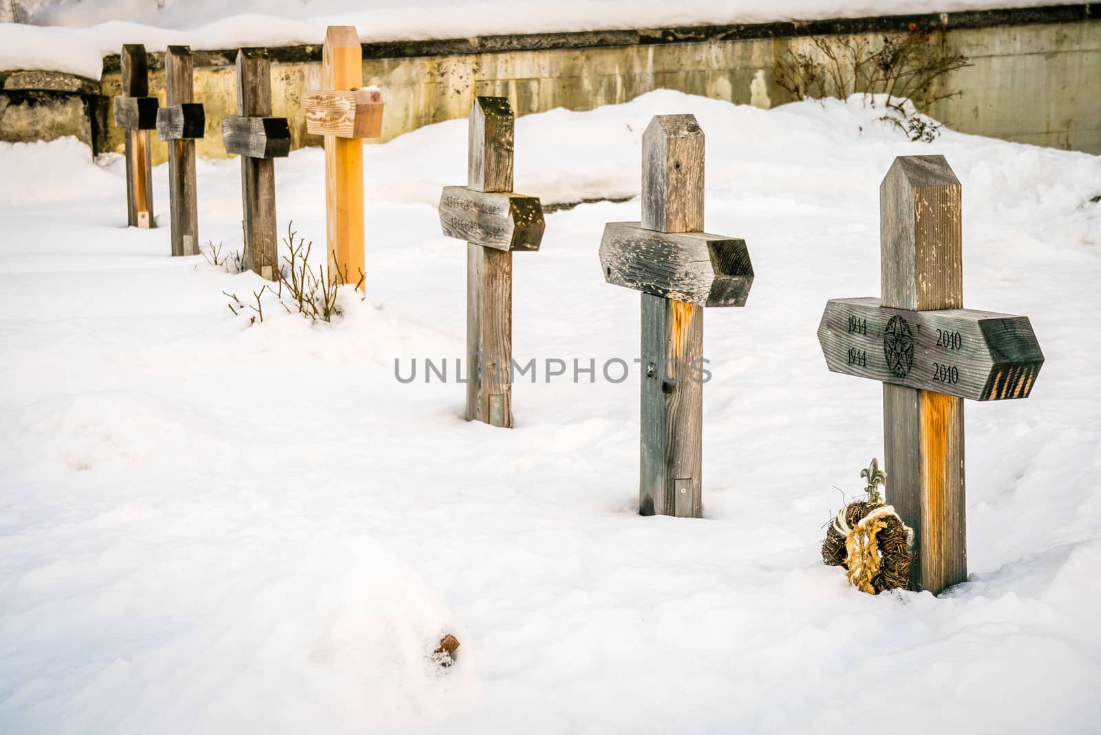 Cemetery under the snow in winter in Switzerland