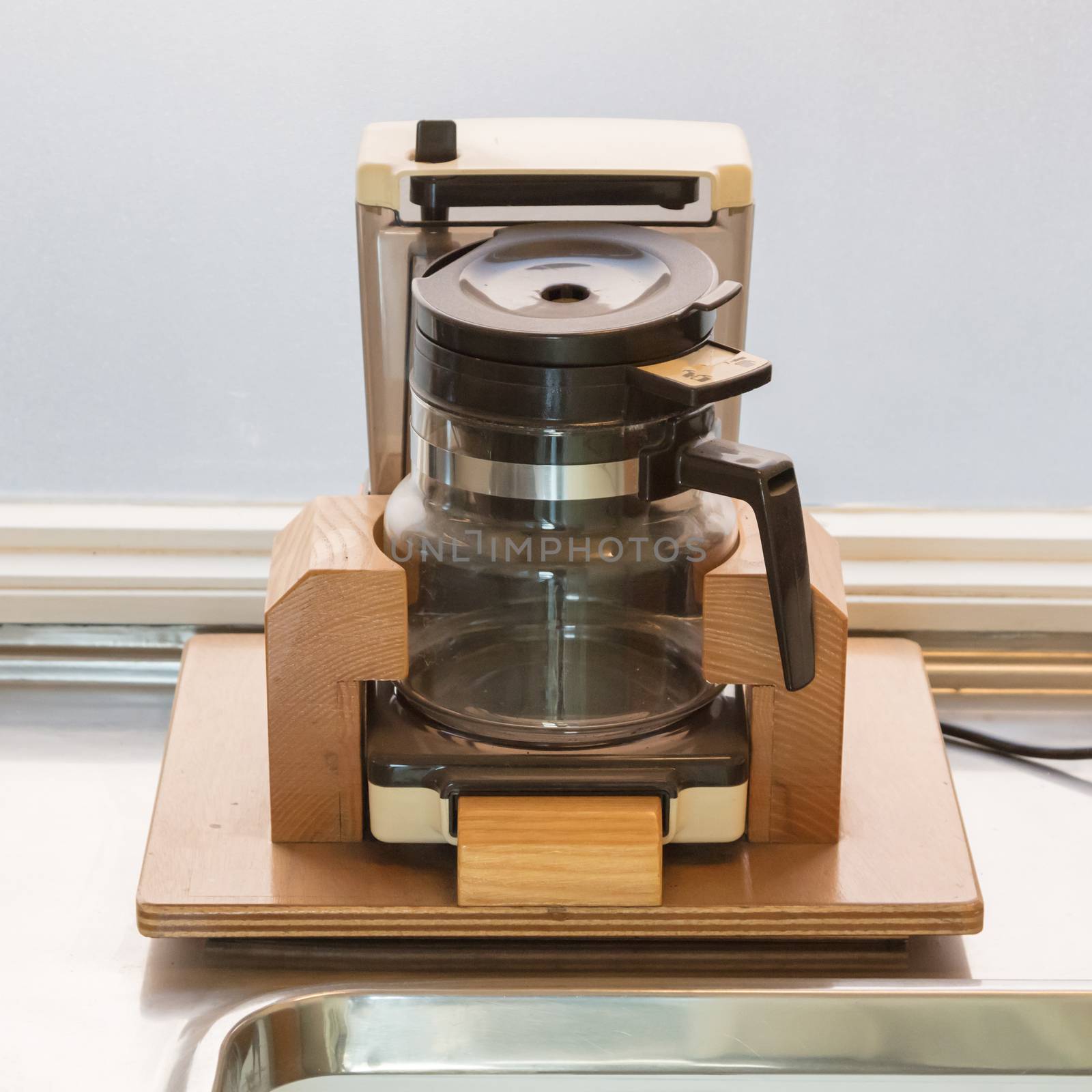 Vintage coffee maker in a dutch train