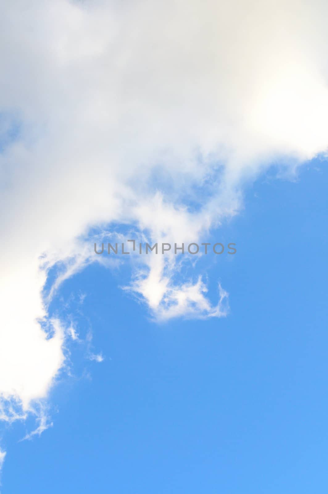 background with light blue sky in the bottom, and softy white cloud above, vertical