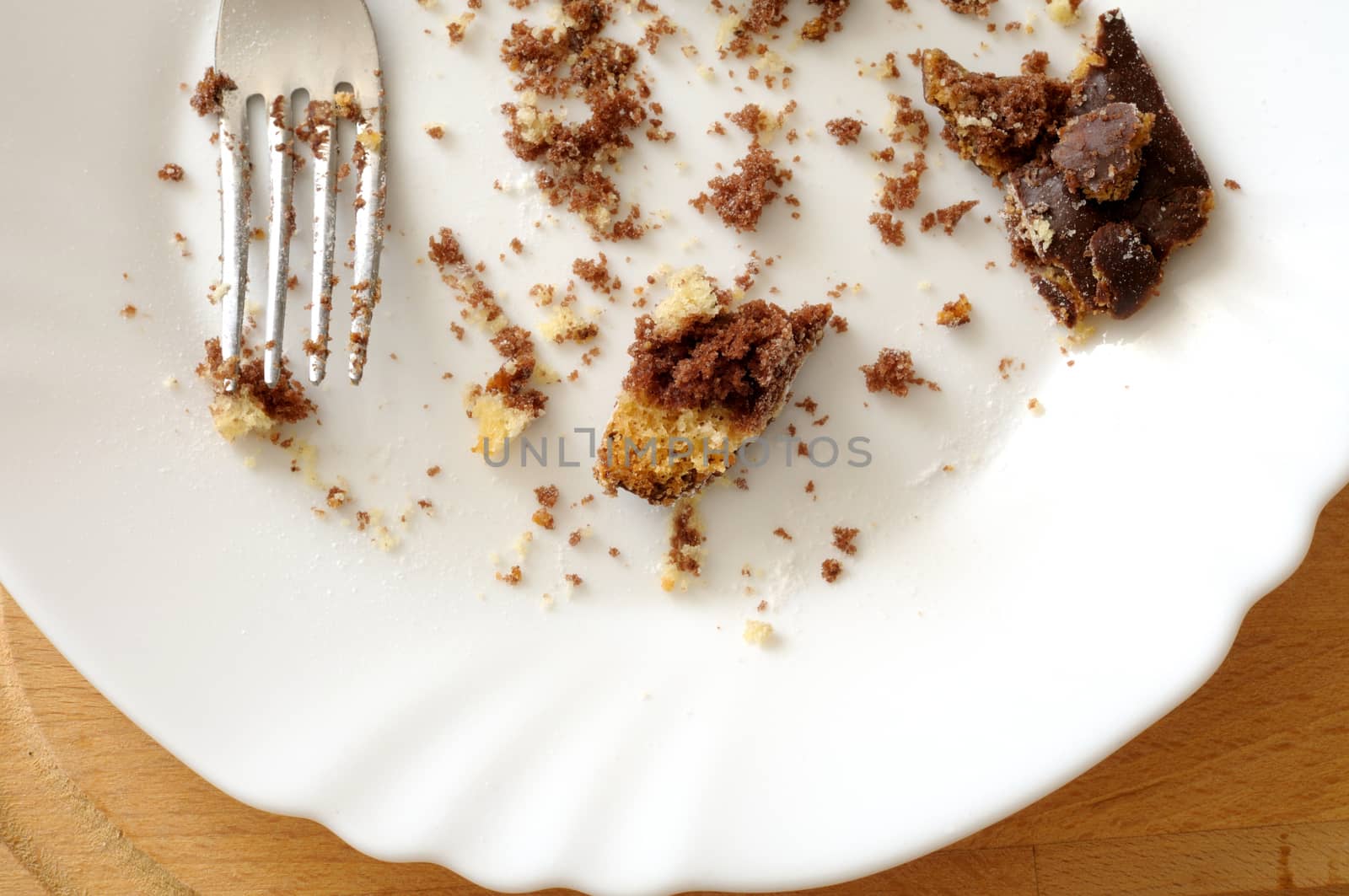 close up of leftover chocolate cake, from above