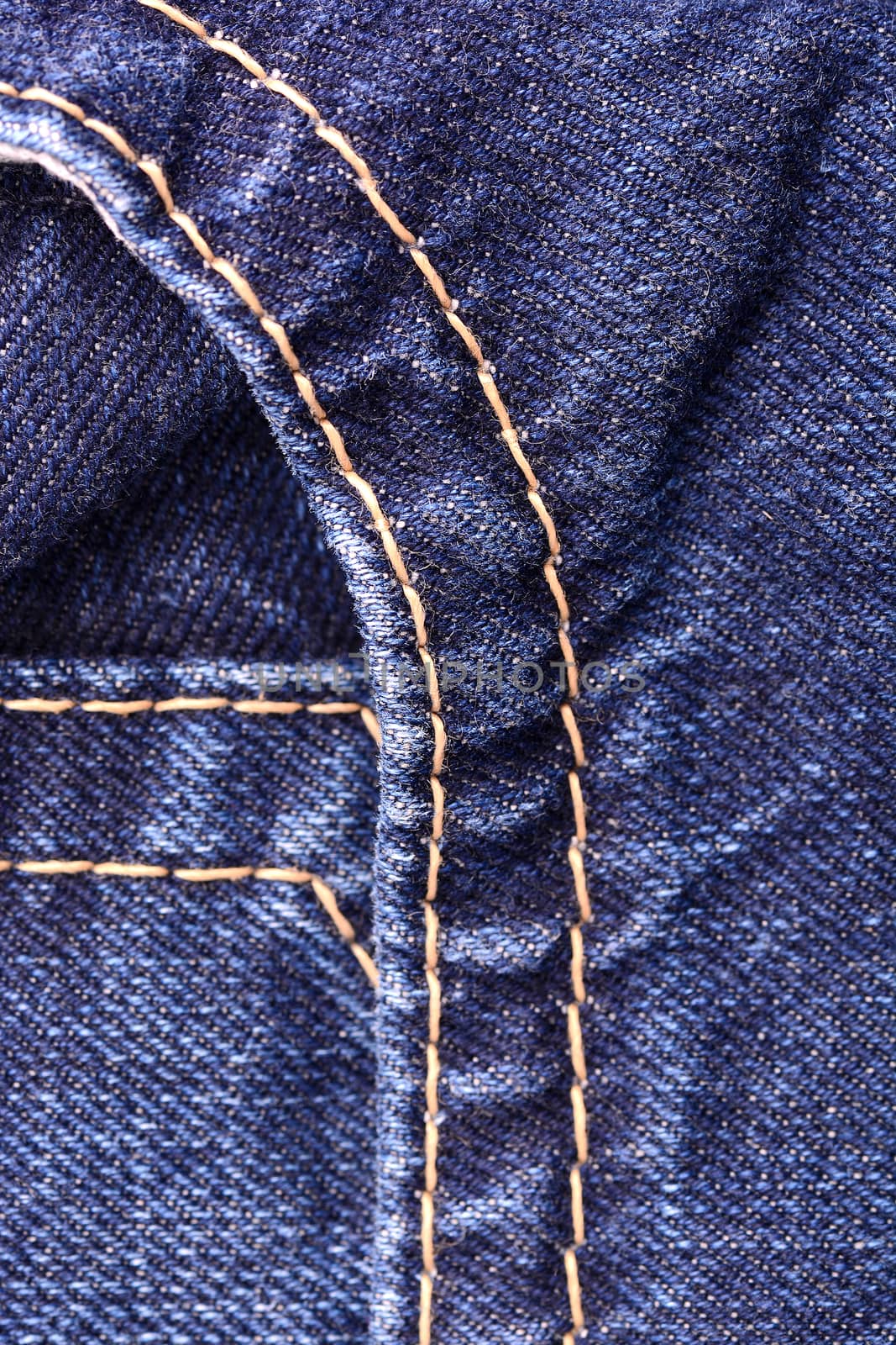 denim jeans background with seam of jeans fashion design. Old grunge vintage denim jean