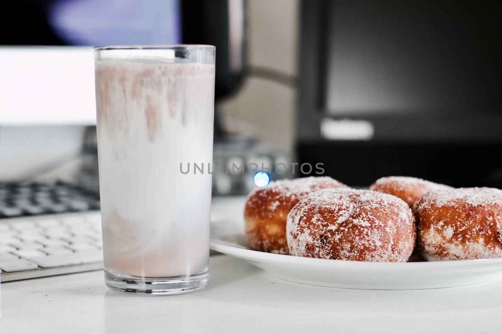 Delicious doughnuts on the white plate. Sweet fresh food concept.