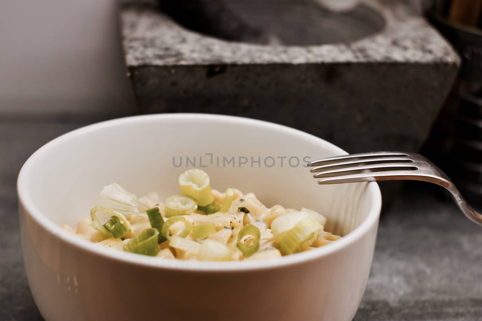 Delicious cheese fresh pasta with vegetables. Home cooking concept.