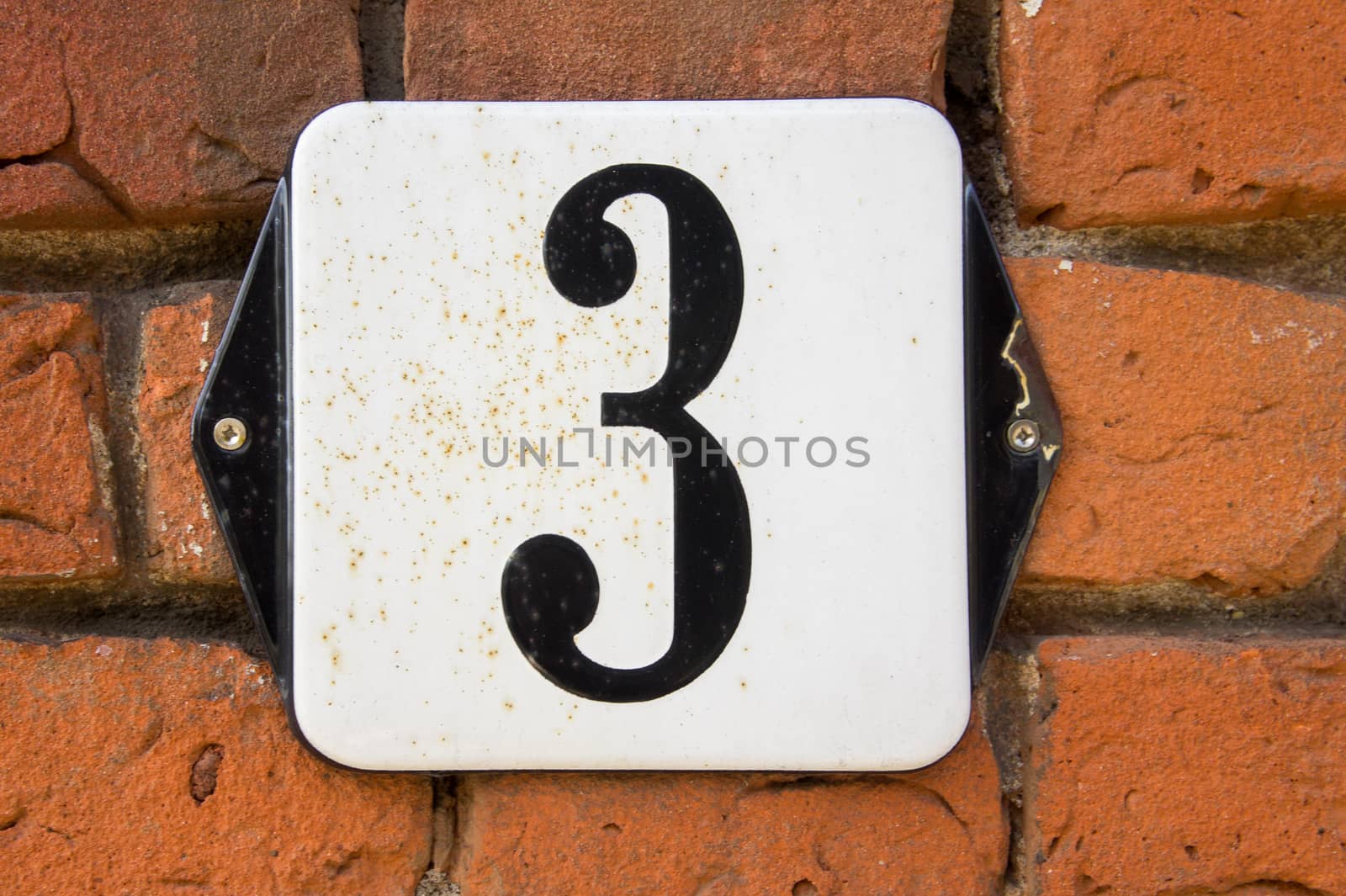 enameled house number three (3)