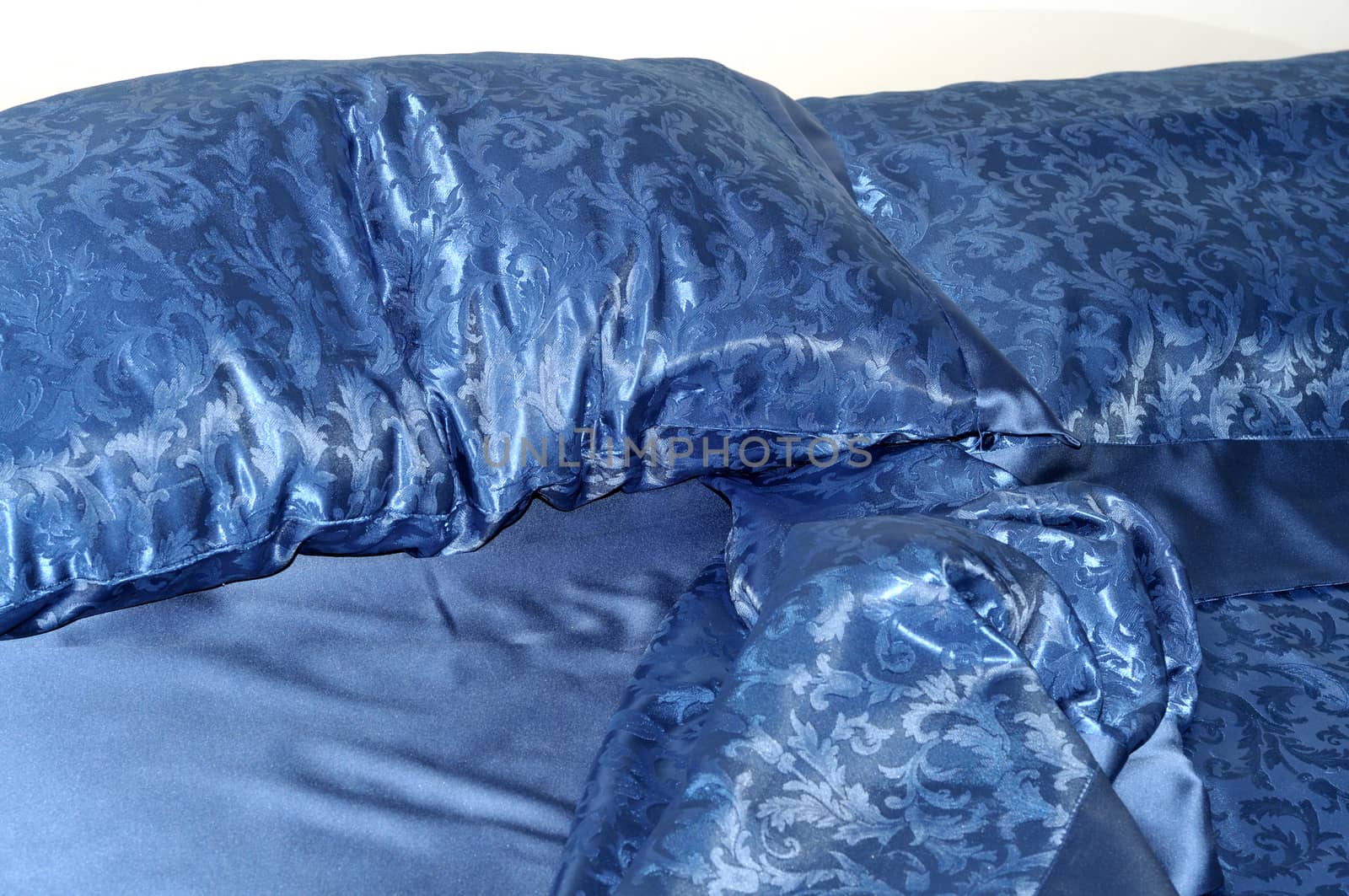 crumpled blue bed, morning sleeper