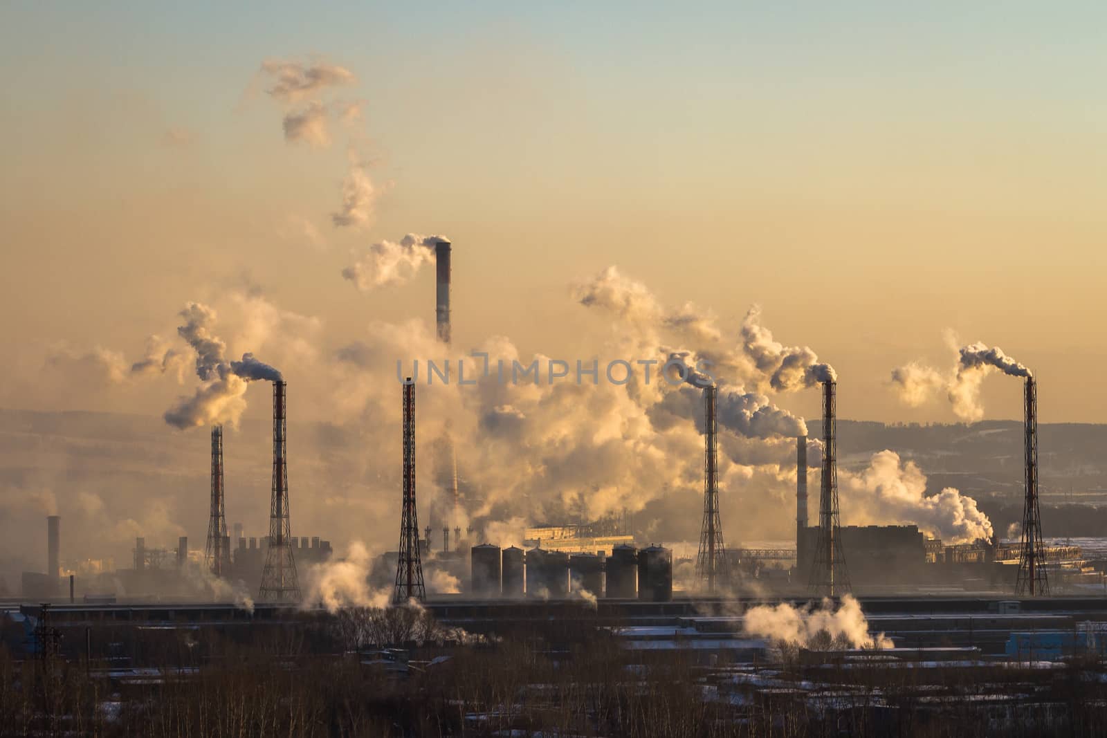 Power plant with smoke and dirty orange air