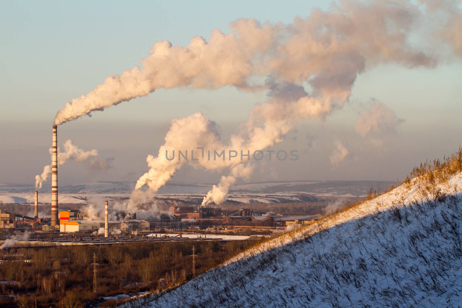 Power plant with smoke and dirty orange air