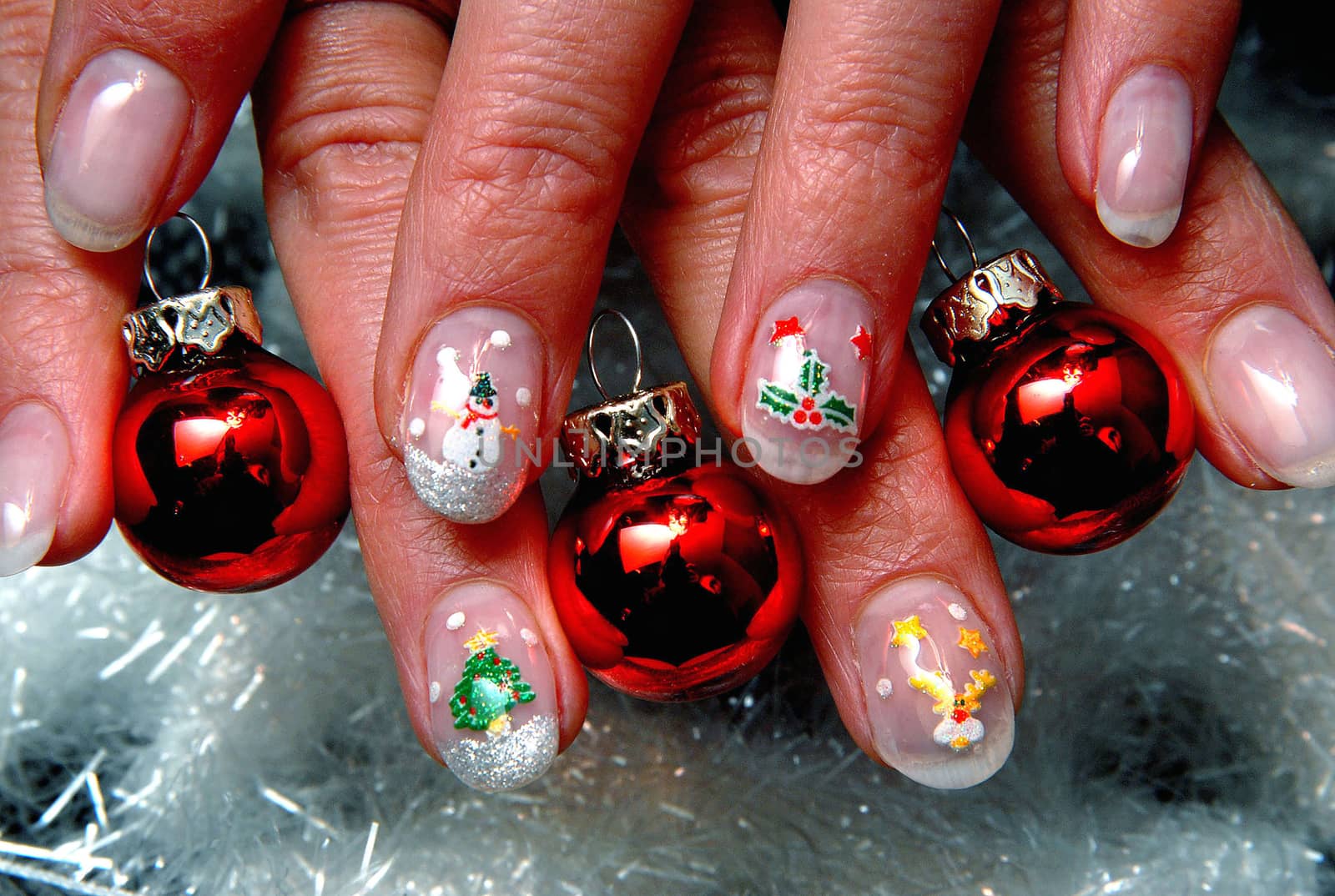 Close-up on red colored fingernails